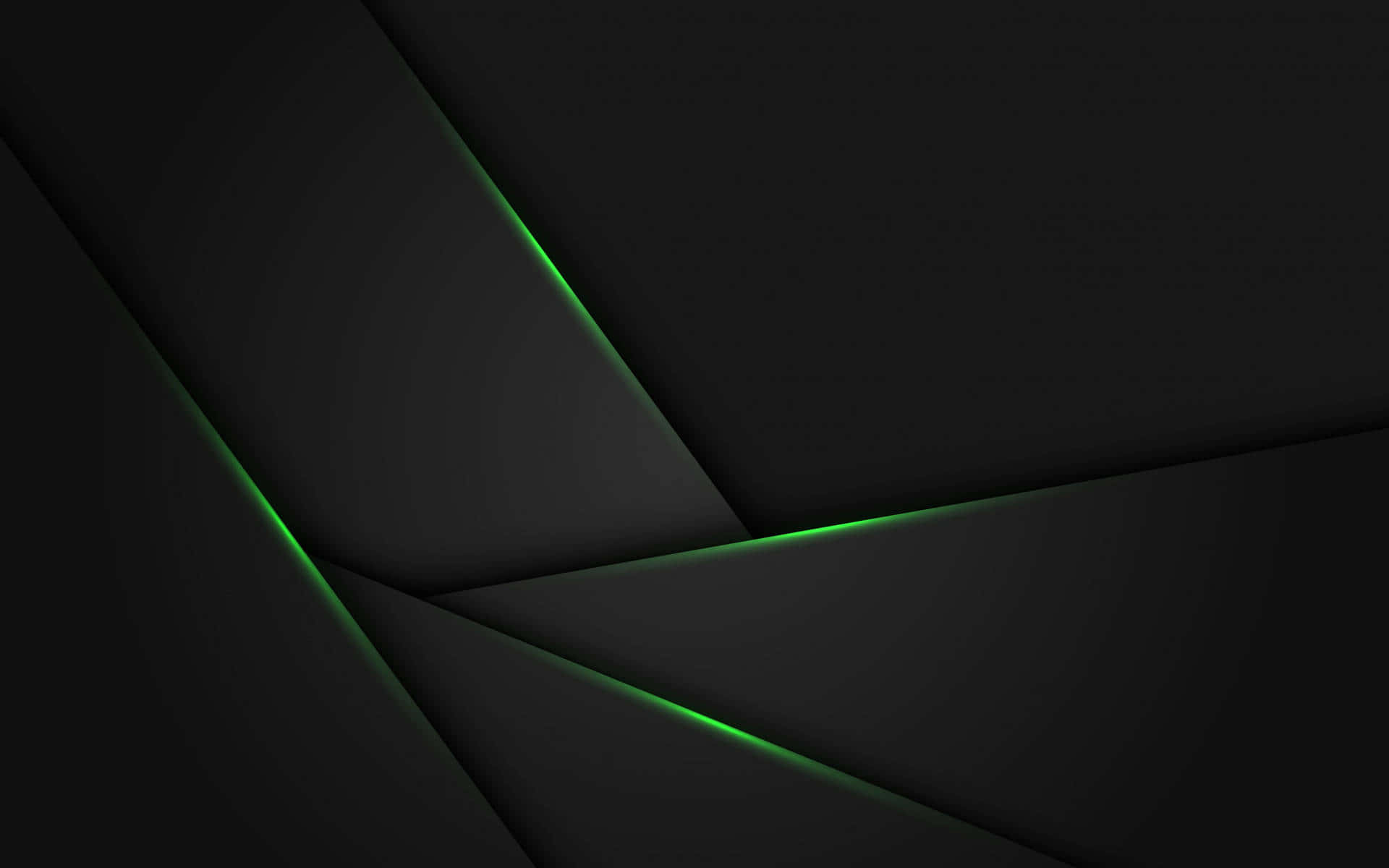 Black And Green 桌布 壁紙 — 發光綠色線條照亮的深色幾何摺疊，營造出時尚現代的抽象構圖。