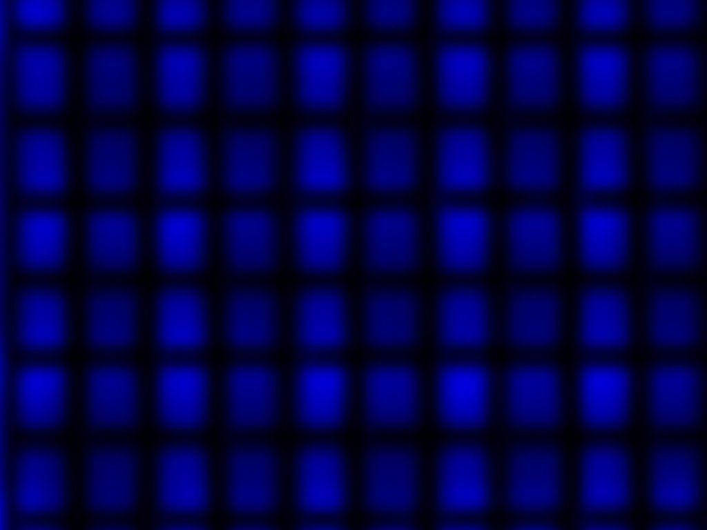 Grid Aesthetic 桌布 壁紙 — 發光藍色正方形的網格逐漸消失在黑暗中，形成數位抽象圖案。