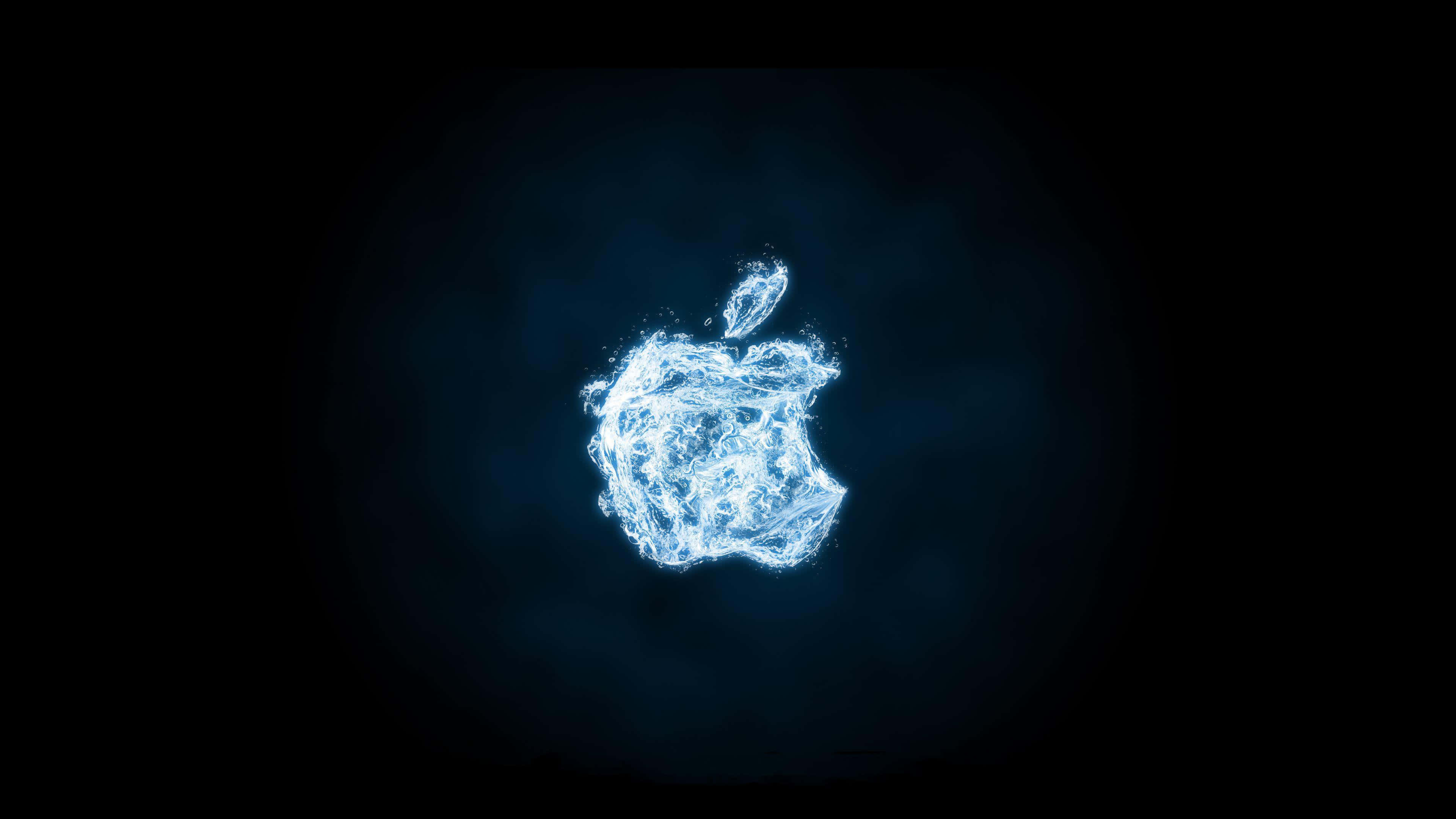 桌布 壁紙 — 發光藍色粒子Apple標誌漂浮在深色漸變背景上。