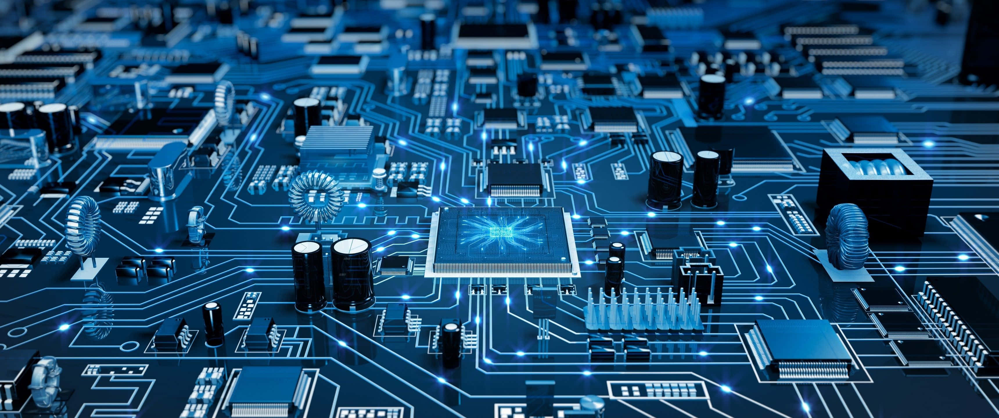Electronics 桌布 壁紙 — 發光藍色電路板的特寫，帶有複雜的路徑和電子元件。