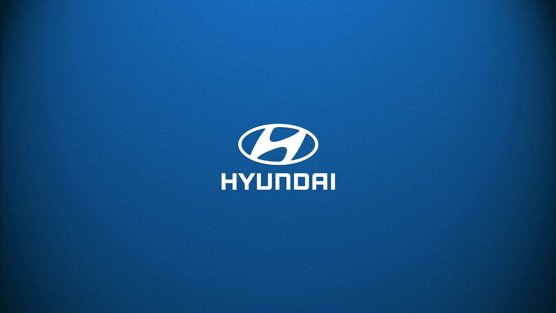 Hyundai 桌布 壁紙 — 白色 Hyundai 標誌居中於純藍色漸變背景上。