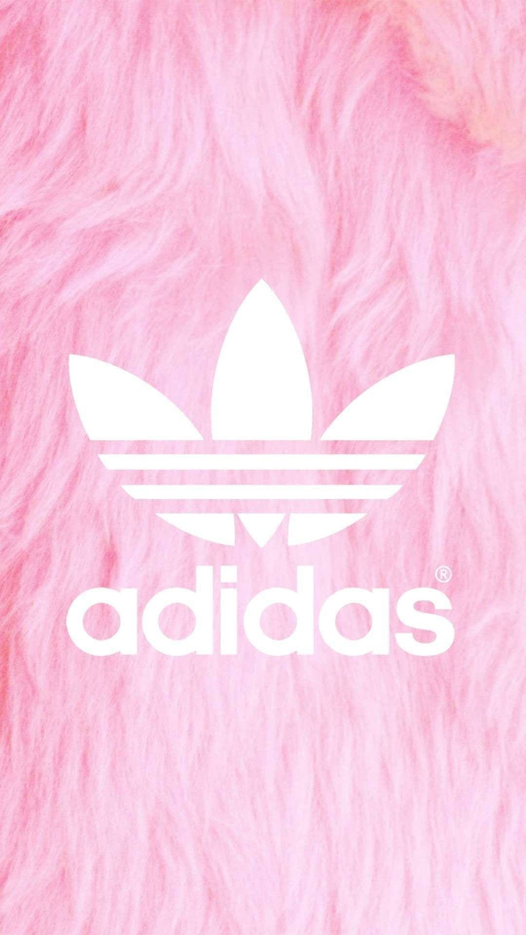 愛迪達 桌布 壁紙 — 白色adidas標誌居中在柔軟蓬鬆的粉紅色背景上。