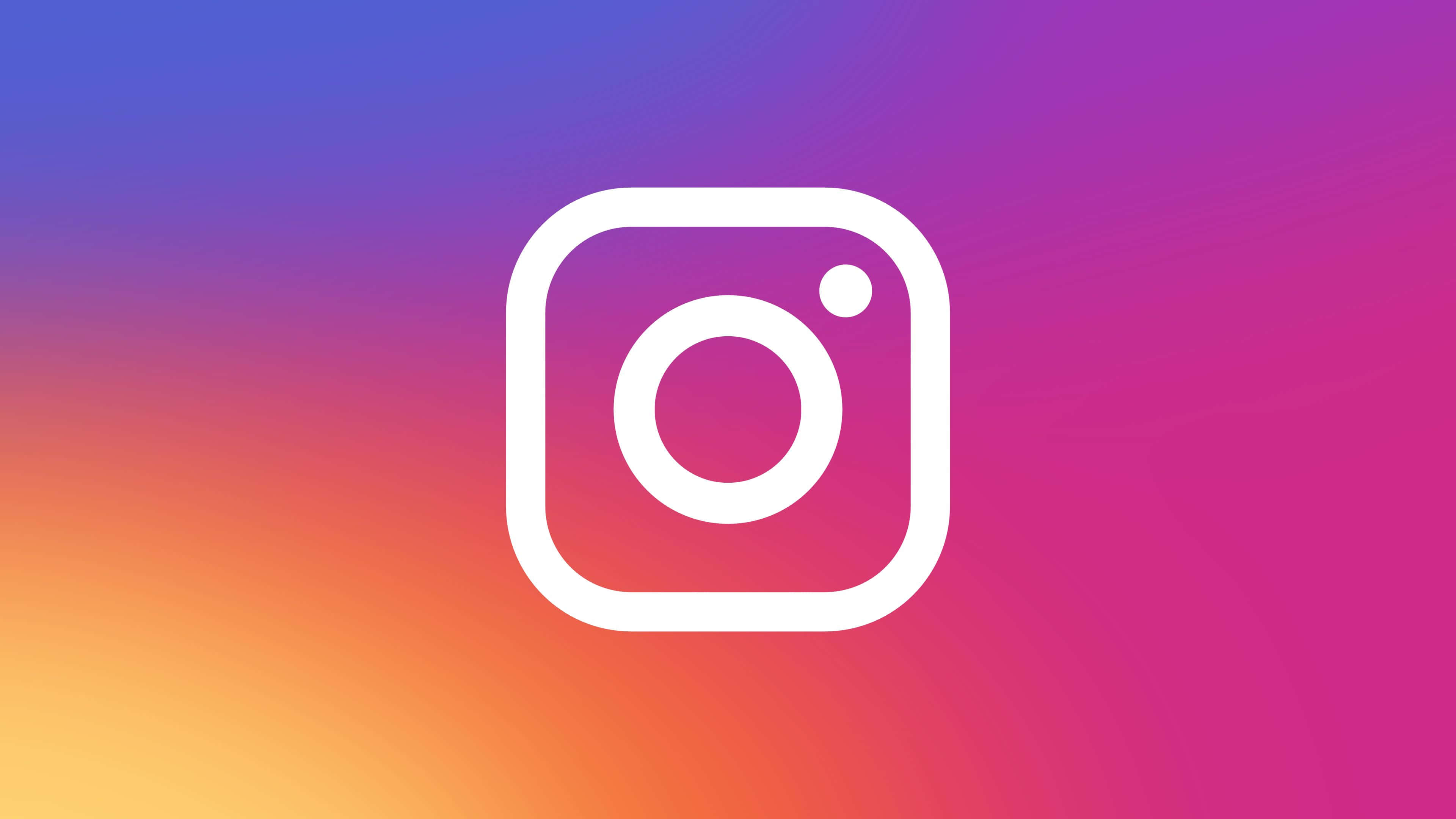 Instagram 桌布 壁紙 — 白色Instagram標誌居中於融合紫色、橙色和粉紅色的鮮豔漸變背景上。