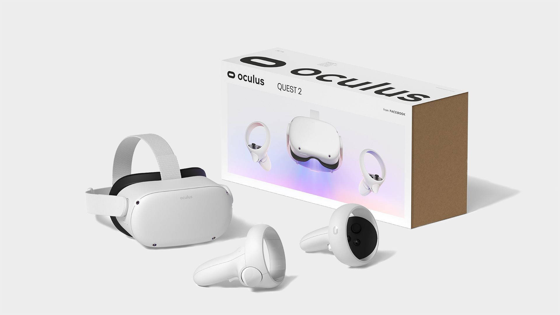 Quest 桌布 壁紙 — 白色Oculus Quest 2 VR頭戴式裝置和控制器，搭配簡約包裝，在乾淨的攝影棚背景上展示。