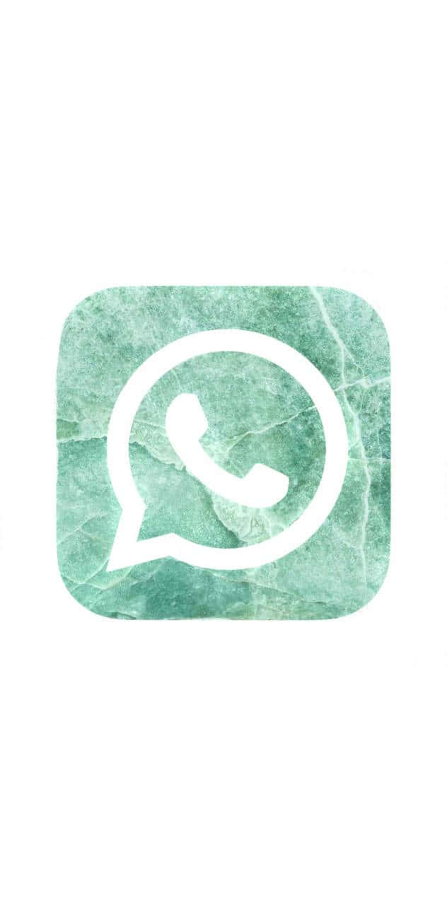 WhatsApp 桌布 壁紙 — 白色WhatsApp標誌居中於帶有細微紋理的綠色大理石背景上。