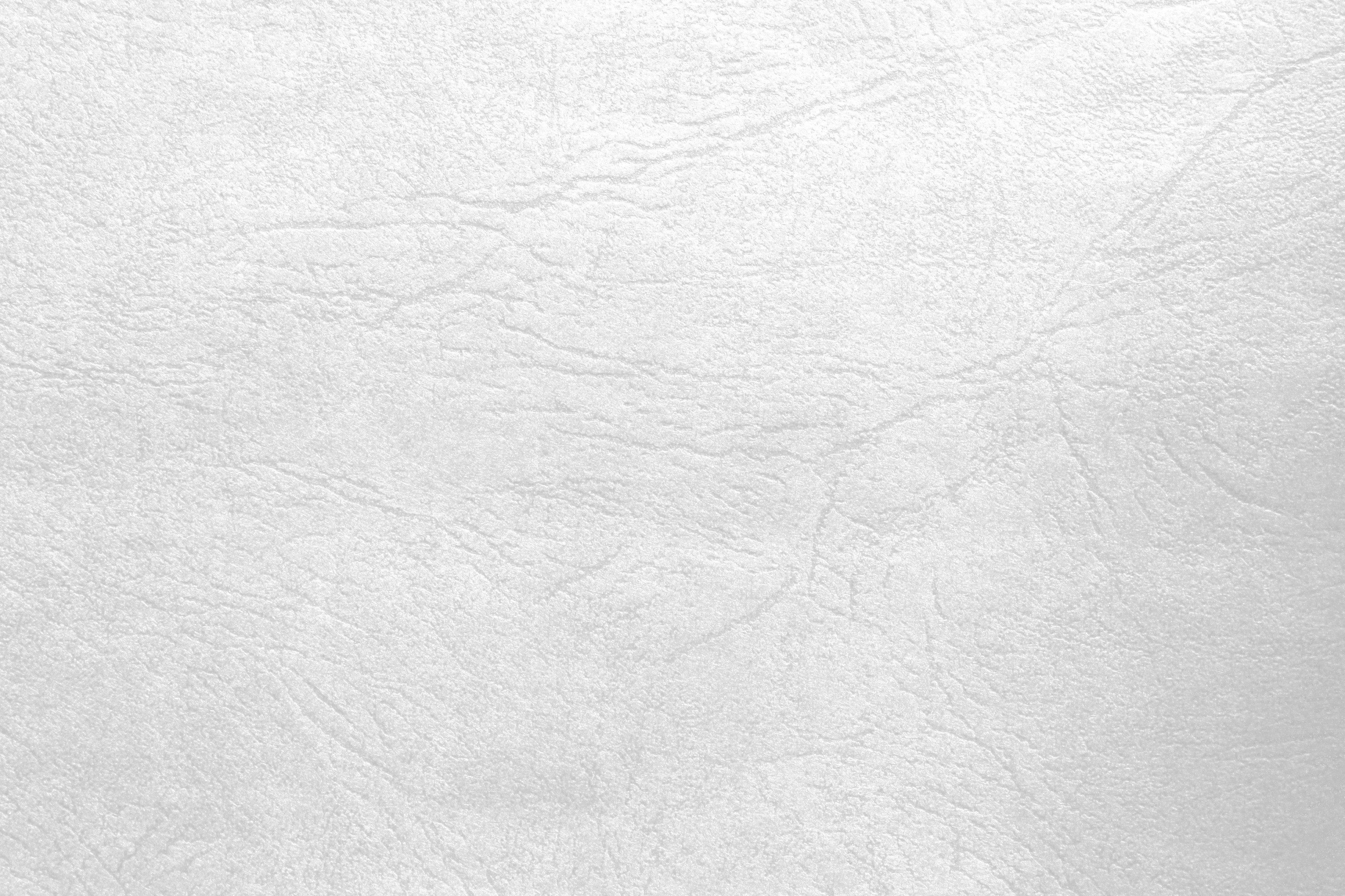 White Texture 桌布 壁紙 — 白色光滑皮革表面的特寫，帶有微妙的自然皺紋和質感。