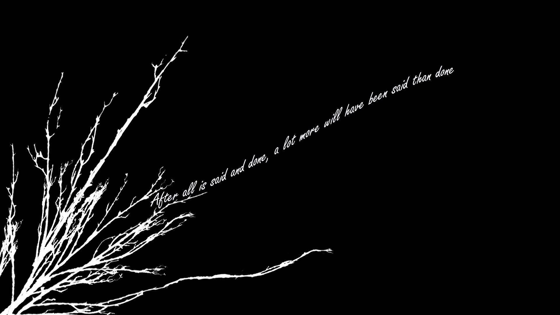 黑白美學動圖 桌布 壁紙 — 白色光禿的樹枝和文字在純黑色背景上對角漂浮。