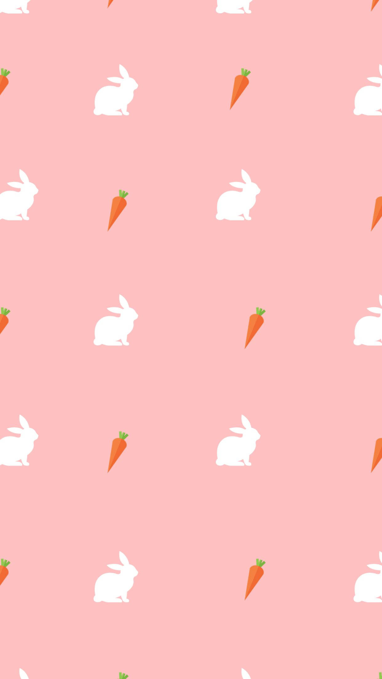 Aesthetic Easter 桌布 壁紙 — 白色兔子和胡蘿蔔在柔和的粉紅色背景上重複，形成一個有趣的復活節圖案。