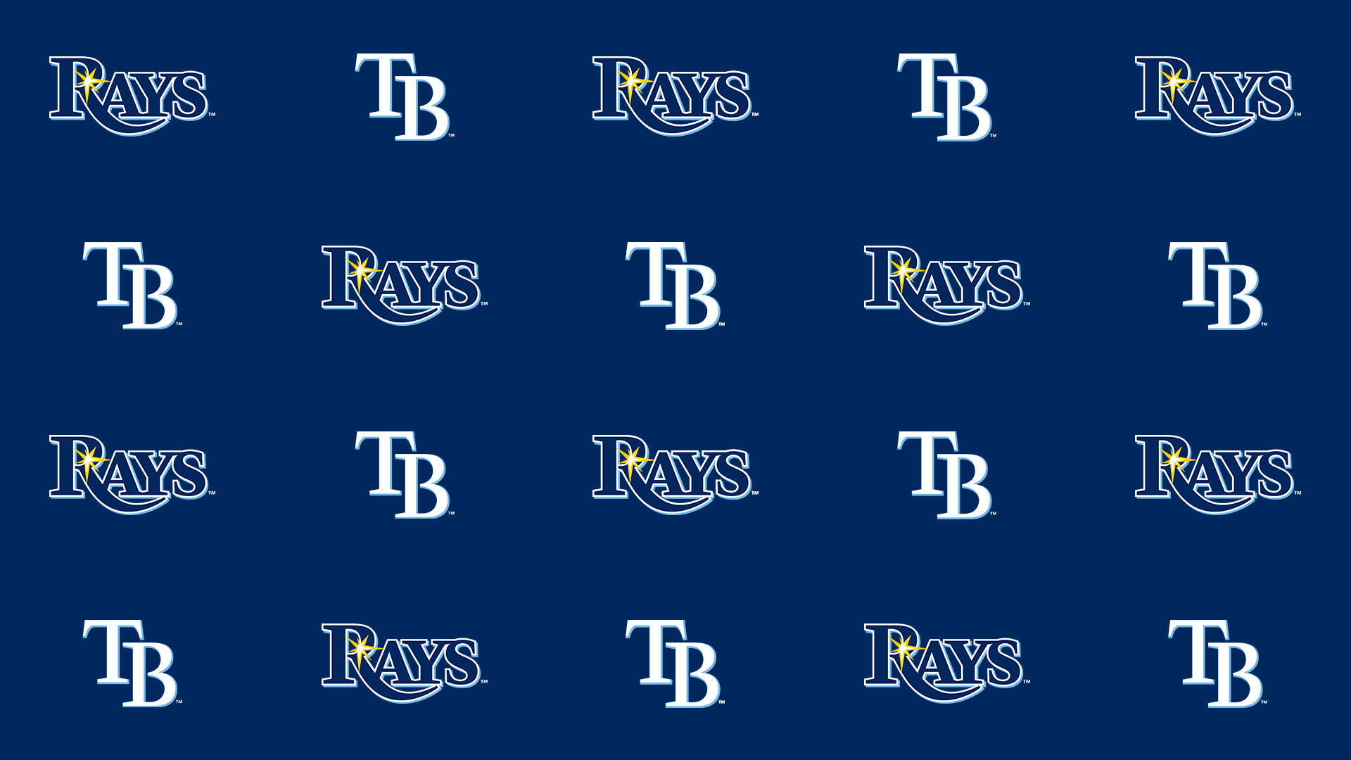 Rays 桌布 壁紙 — 白色坦帕灣光芒隊標誌在深藍色背景上以網格排列。