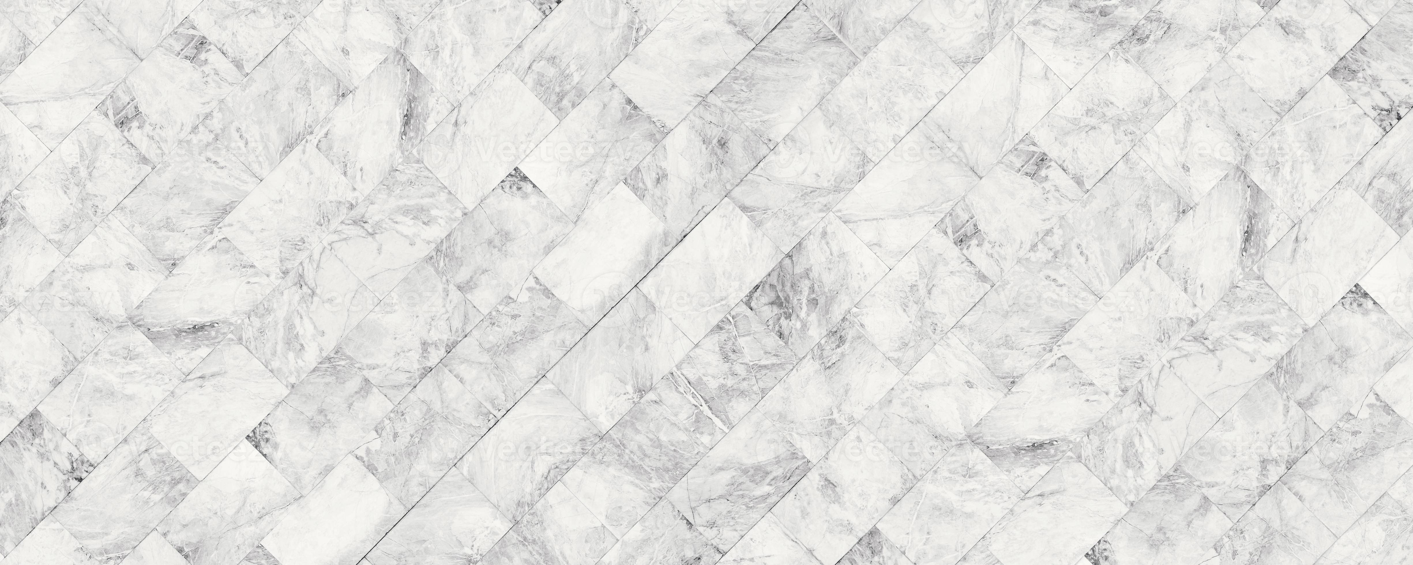 Floor Tiles 桌布 壁紙 — 白色大理石瓷磚以對角人字形圖案排列，帶有灰色紋理。
