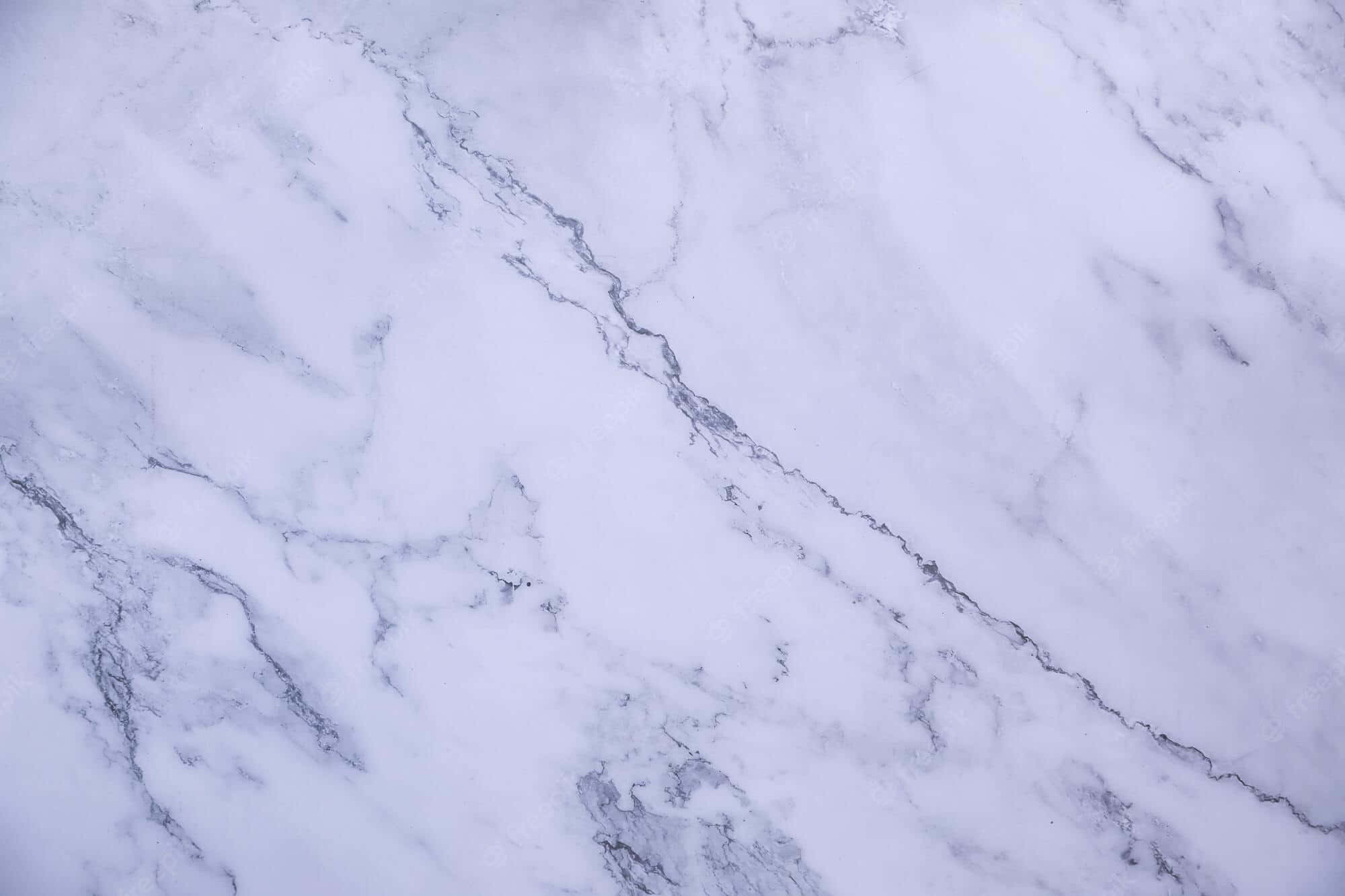 Marble Macbook 桌布 壁紙 — 白色大理石的近距離特寫，帶有優雅的灰色紋理，營造出奢華精緻的質感。