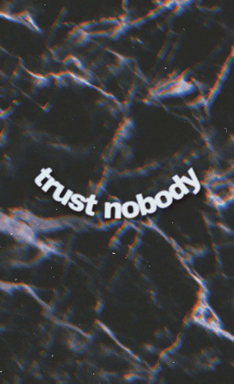 Marble Quotes 桌布 壁紙 — 白色字體的「trust nobody」文字疊加在帶有發光藍色和橙色故障光效的深色抽象背景上。