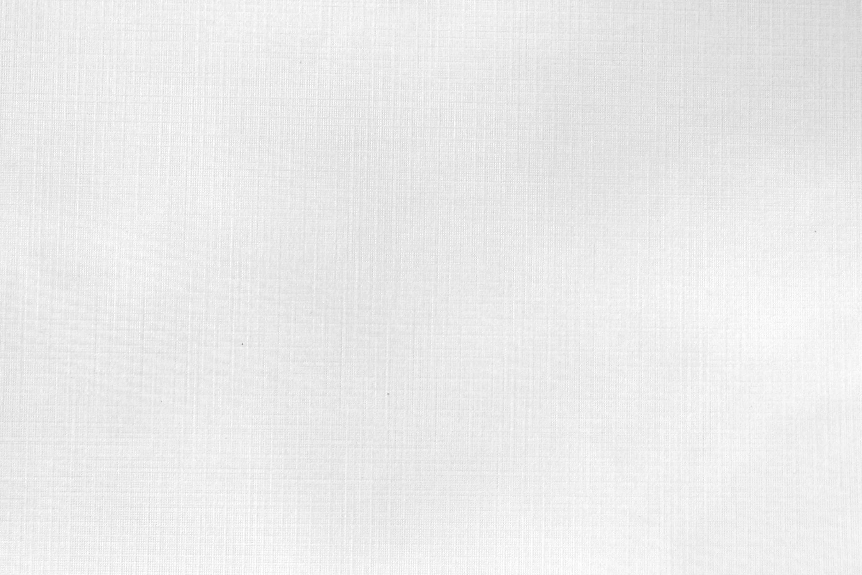 White Paper 桌布 壁紙 — 白色平滑布料的特寫，帶有細微的編織紋理和柔和光線。