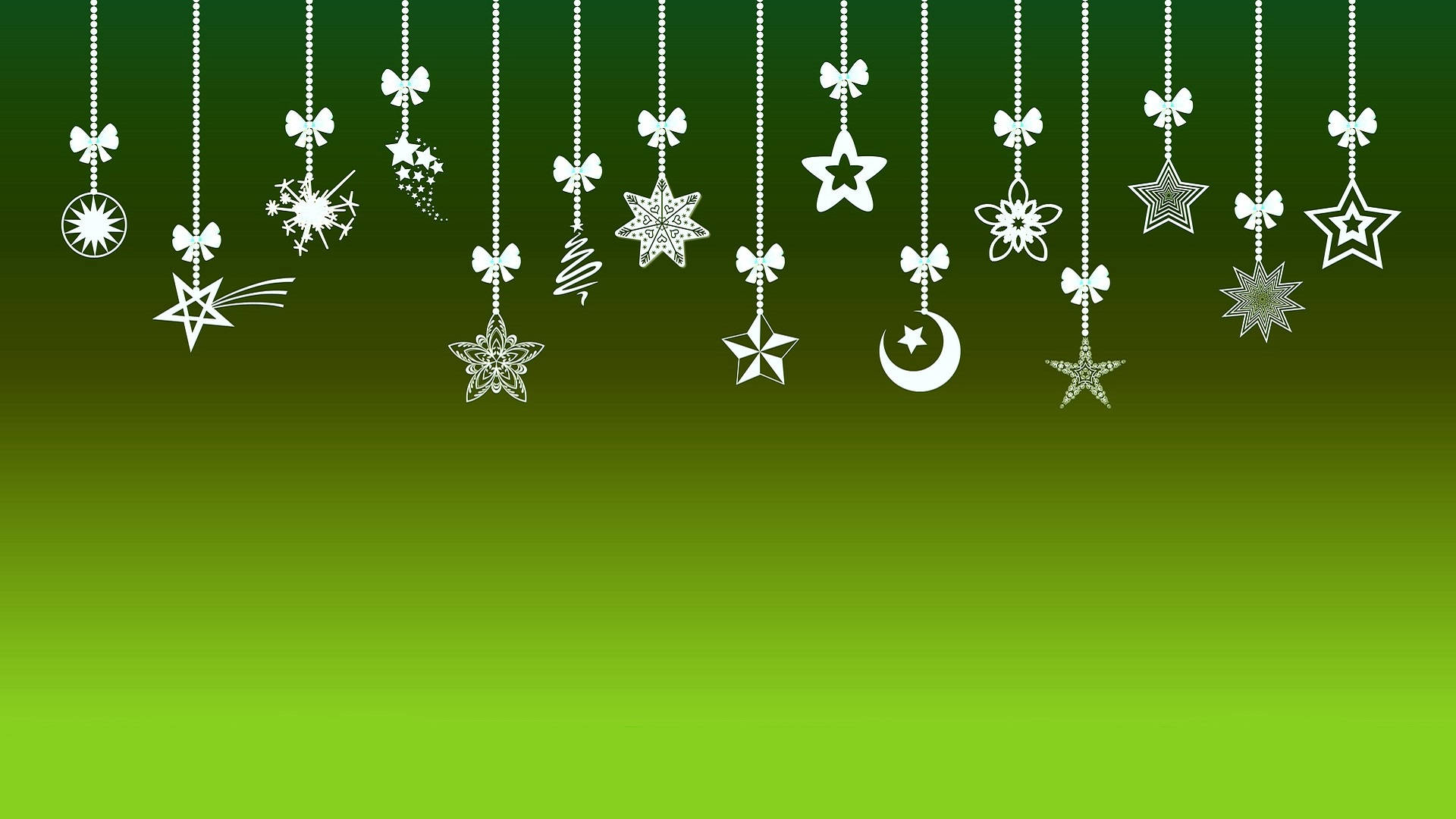 Minimalist Christmas 桌布 壁紙 — 白色懸掛裝飾品，包括星星、新月和蝴蝶結，在充滿活力的綠色漸變背景上搖曳。