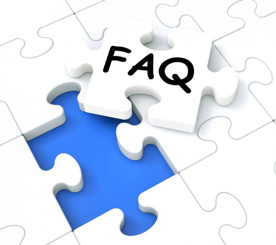 Questions 桌布 壁紙 — 白色拼圖塊圍繞著一個缺失的藍色塊，中央塊上有「FAQ」文字。