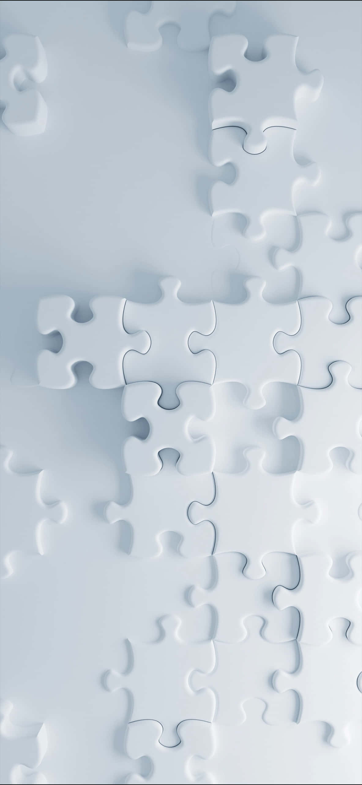 Puzzle 桌布 壁紙 — 白色拼圖碎片散落在柔軟的藍色表面上，帶有柔和的陰影和簡潔的極簡線條。
