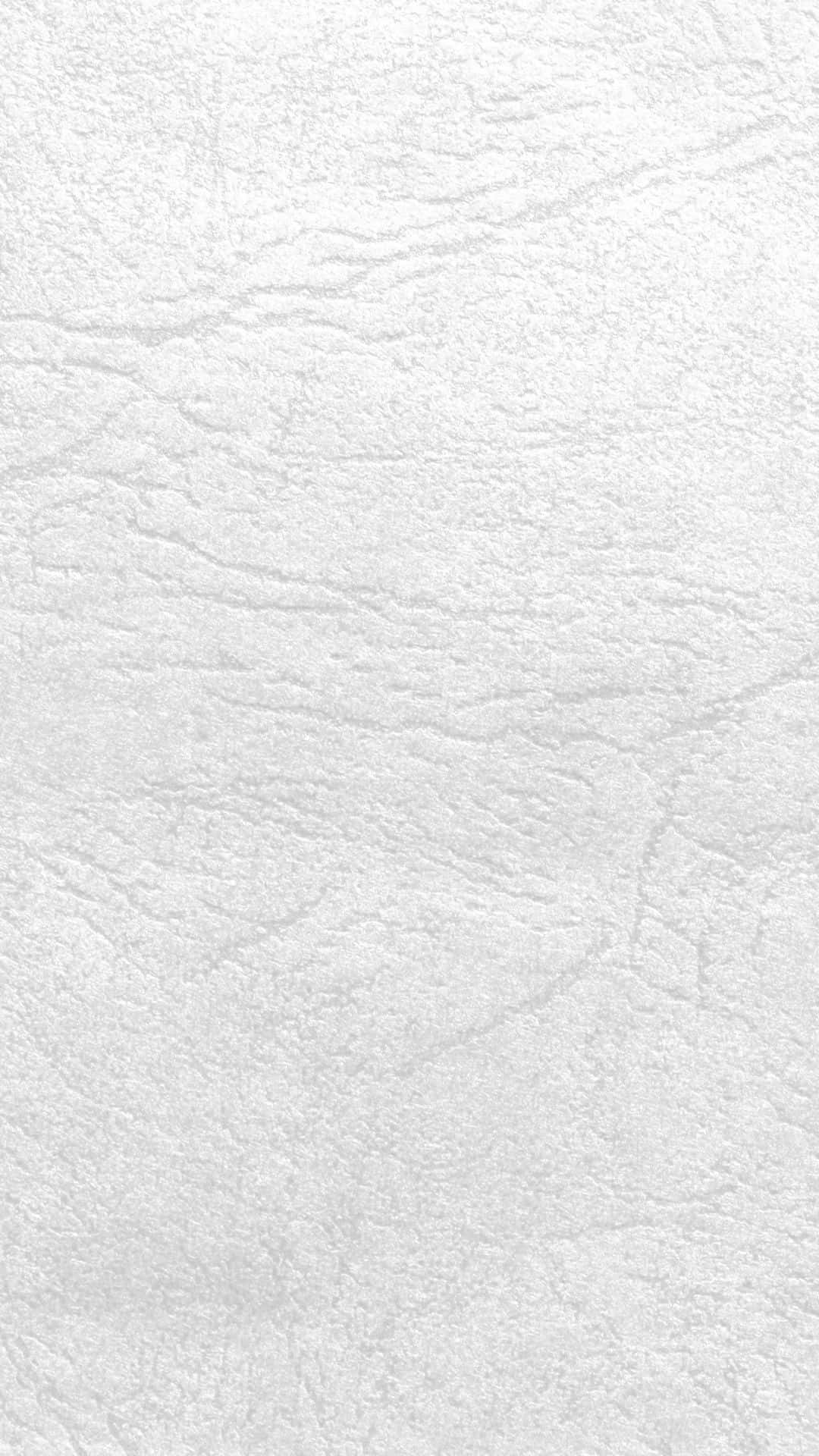 White Texture 桌布 壁紙 — 白色柔軟紋理表面的特寫，帶有微妙的自然皺褶和柔和陰影。
