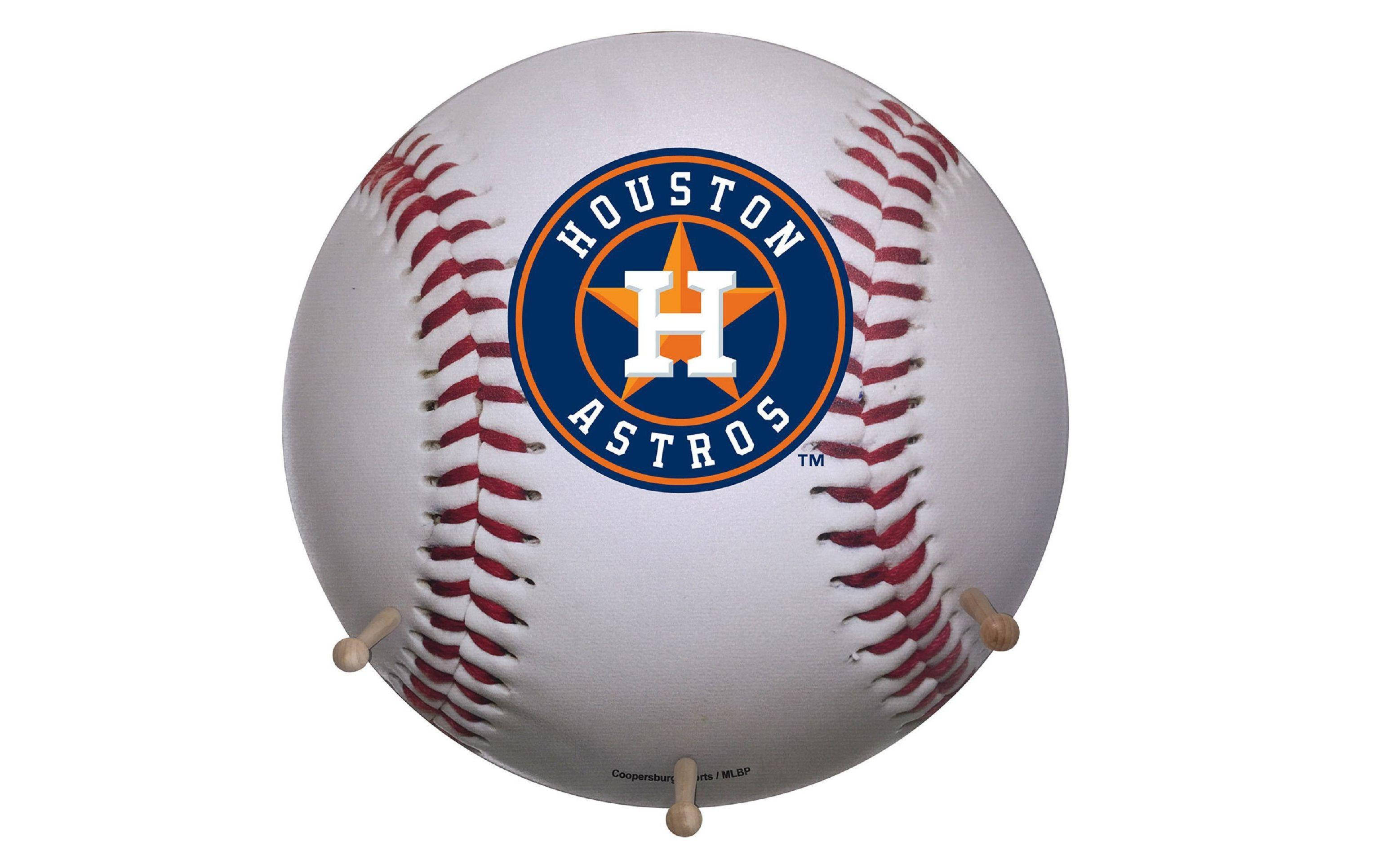 Astros 桌布 壁紙 — 白色棒球的特寫，表面中央有紅色縫線和休士頓太空人標誌。