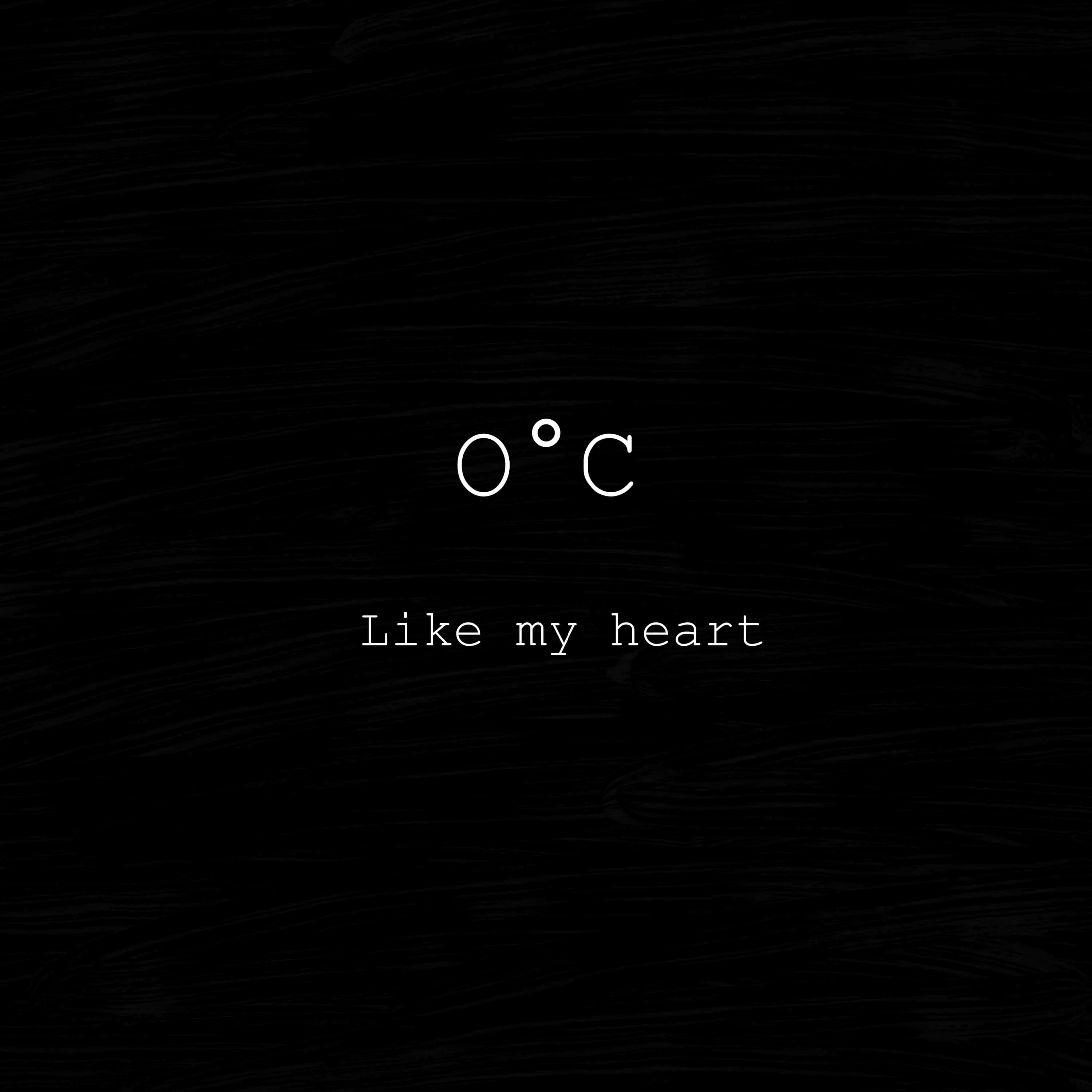 簡約 桌布 壁紙 — 白色極簡文字在紋理黑色背景上顯示「0°C Like my heart」。