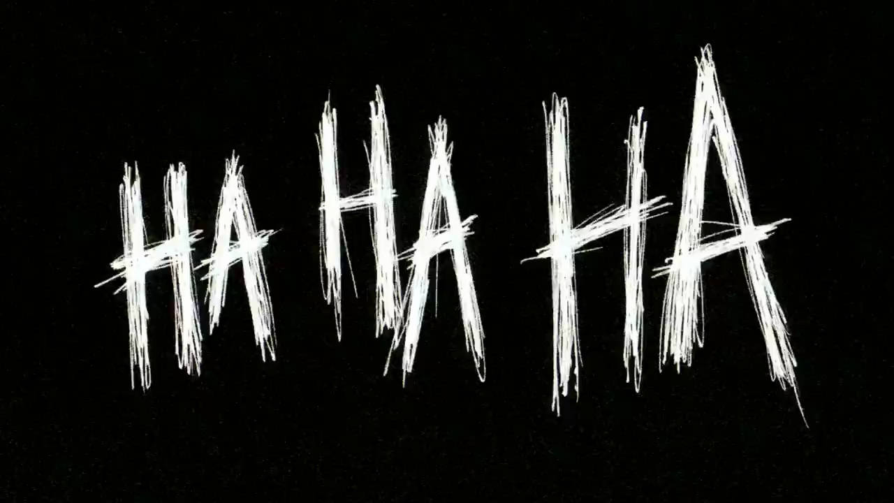 哈哈哈 桌布 壁紙 — 白色混亂塗鴉文字在純黑色背景上拼寫HA HA HA。