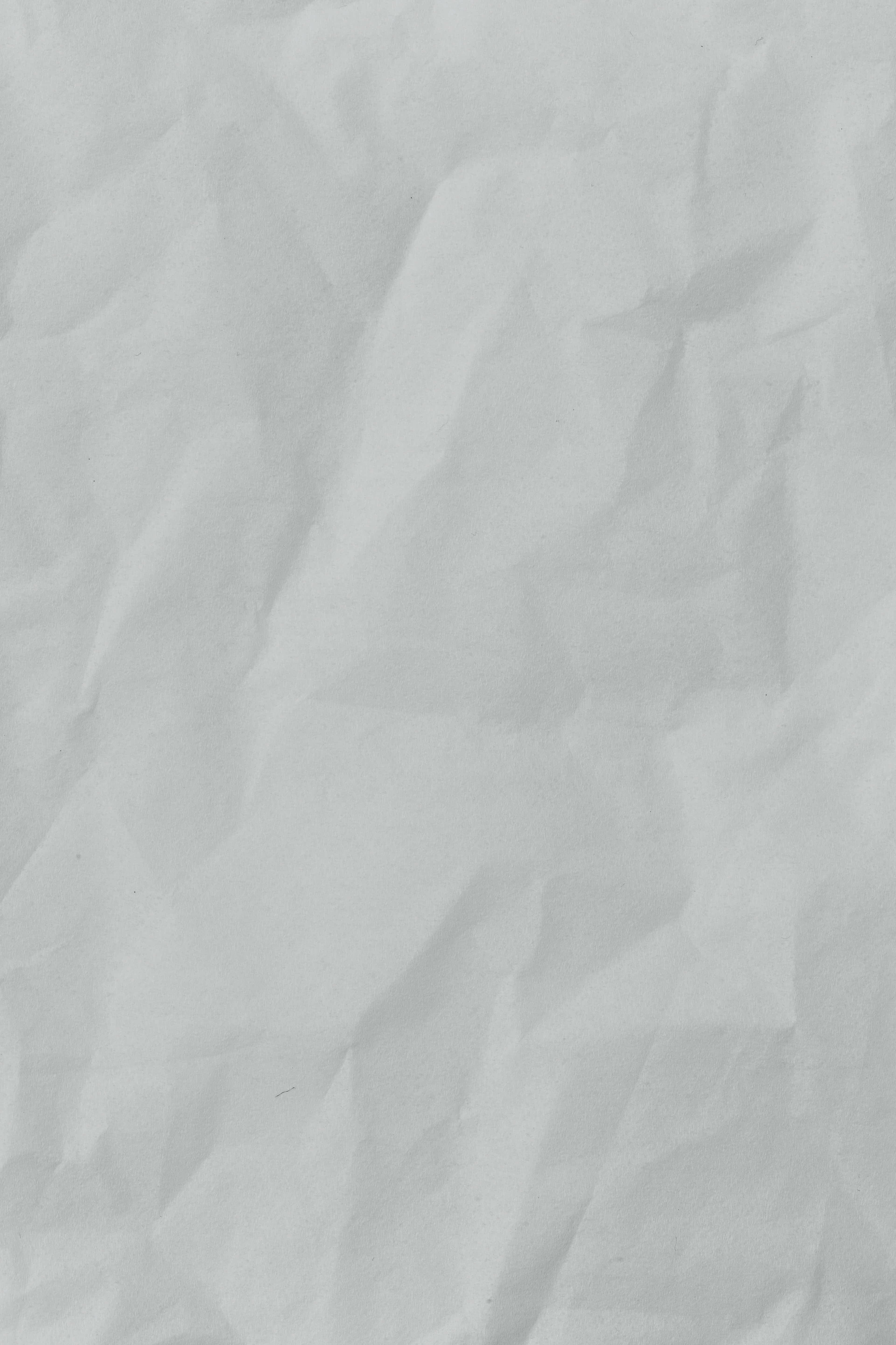 paper 桌布 壁紙 — 白色皺紙的特寫，帶有柔和陰影和細膩摺痕，營造出紋理表面。