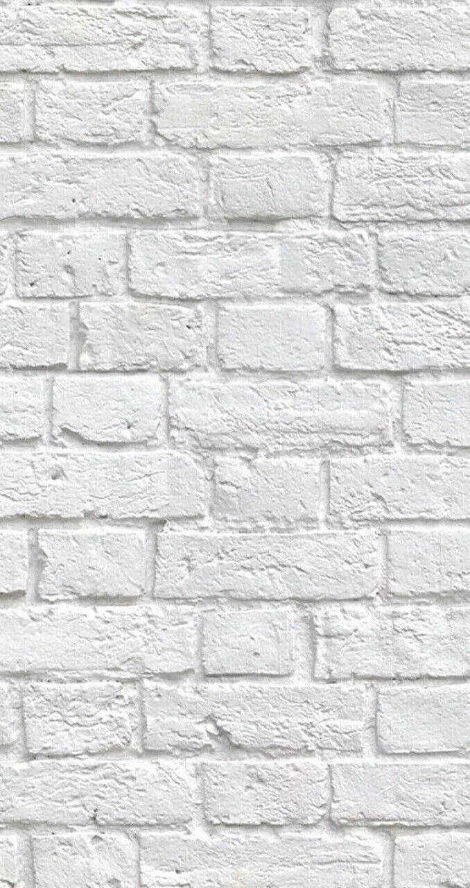 White Brick 桌布 壁紙 — 白色磚牆的特寫，帶有紋理灰泥和微妙的灰色陰影。