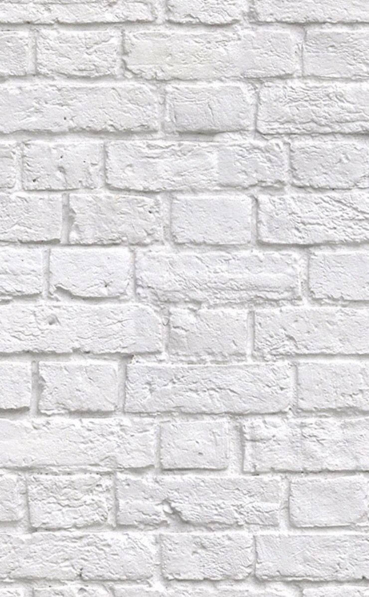 White Brick 桌布 壁紙 — 白色磚牆的特寫，顯示有紋理的砂漿和長方形磚塊，形成經典圖案。
