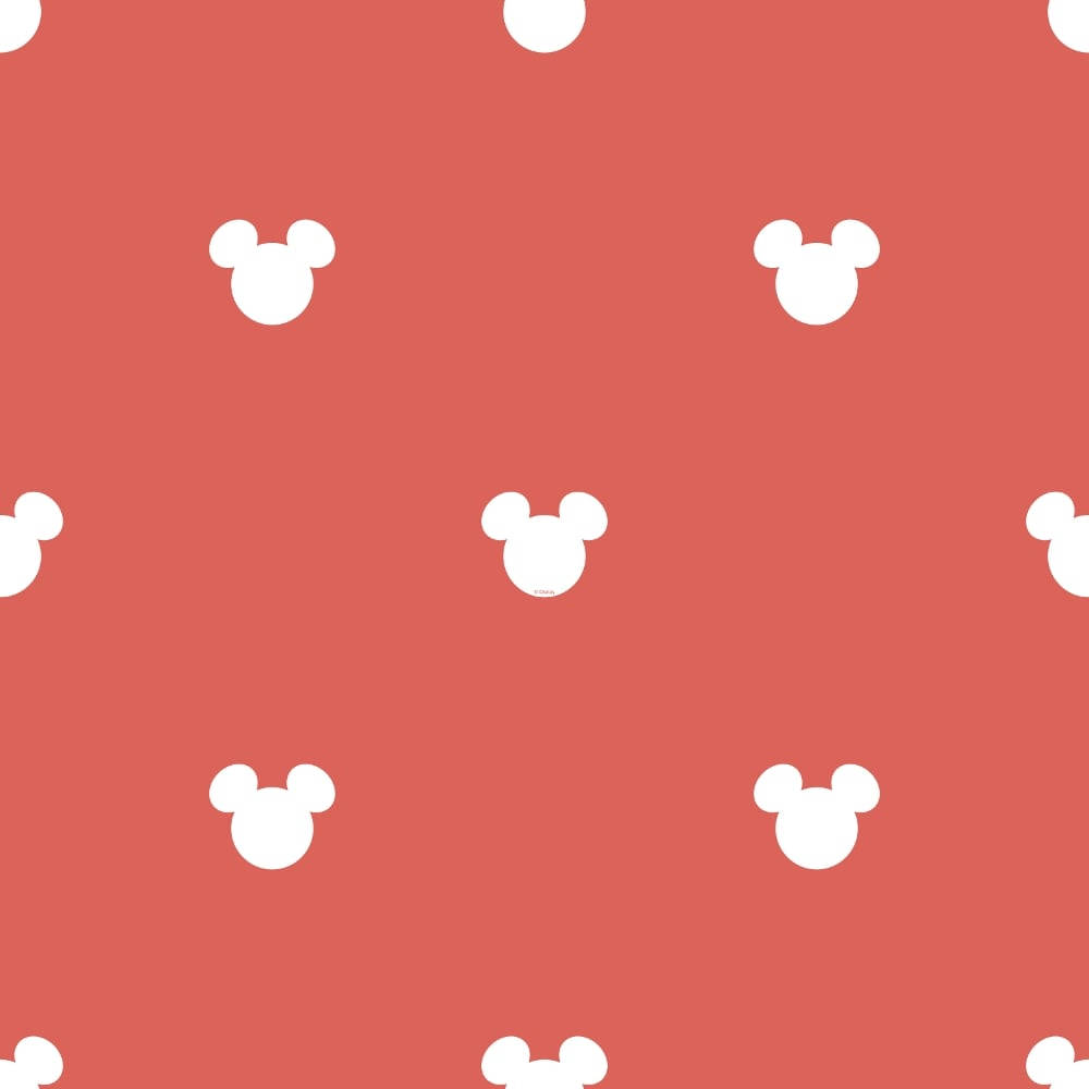 Disney Pattern 桌布 壁紙 — 白色米奇老鼠頭部剪影散落在純珊瑚粉紅色背景上，形成重複圖案。