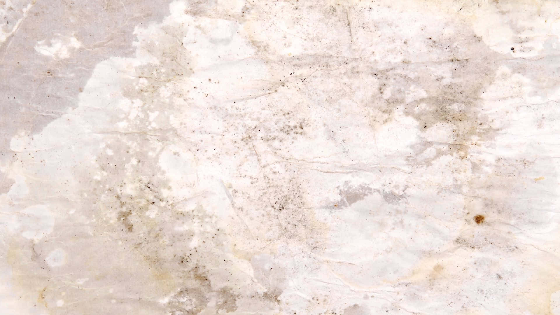 Old Paper Texture 桌布 壁紙 — 白色紋理大理石表面的特寫，帶有細微的灰色紋理和斑點狀大地色調。