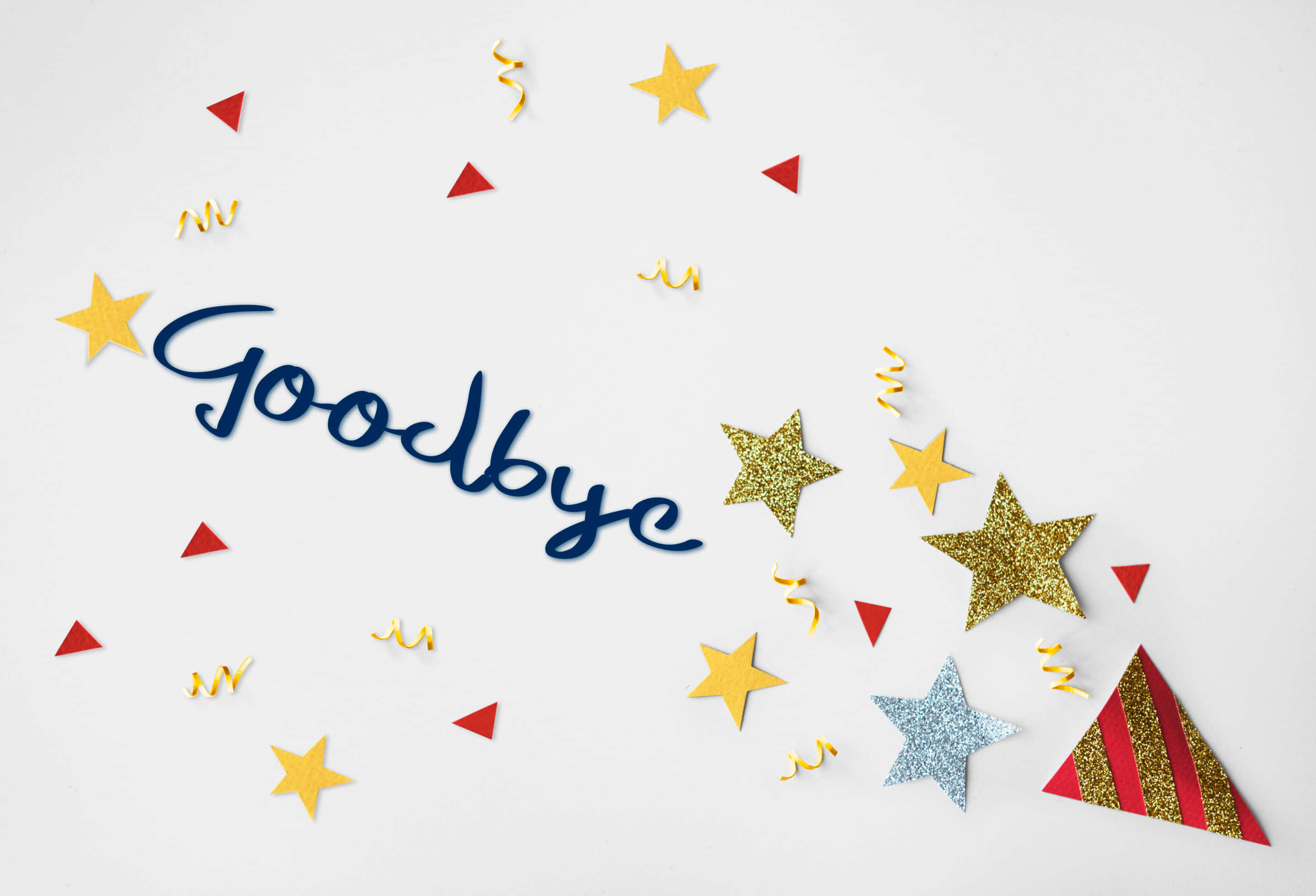 Farewell 桌布 壁紙 — 白色背景上，藍色草書的「goodbye」字樣，周圍環繞著金色、銀色和紅色的星星、五彩紙屑和派對帽。