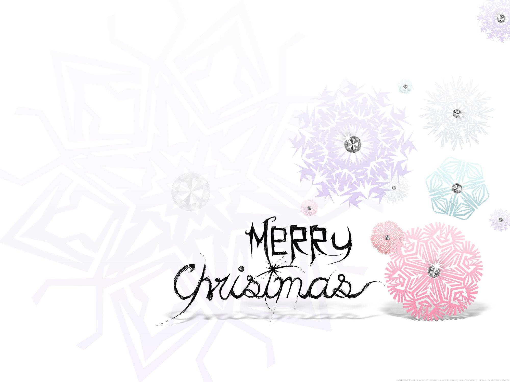 聖誕美學 桌布 壁紙 — 白色背景上，黑色手寫字體的「Merry Christmas」文字，周圍環繞著帶有寶石中心的彩色紙雪花。