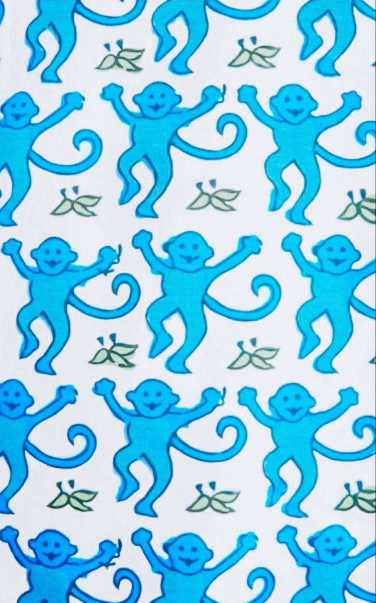 Preppy 桌布 壁紙 — 白色背景上重複的圖案，包含快樂的藍色卡通猴子與綠色葉子。