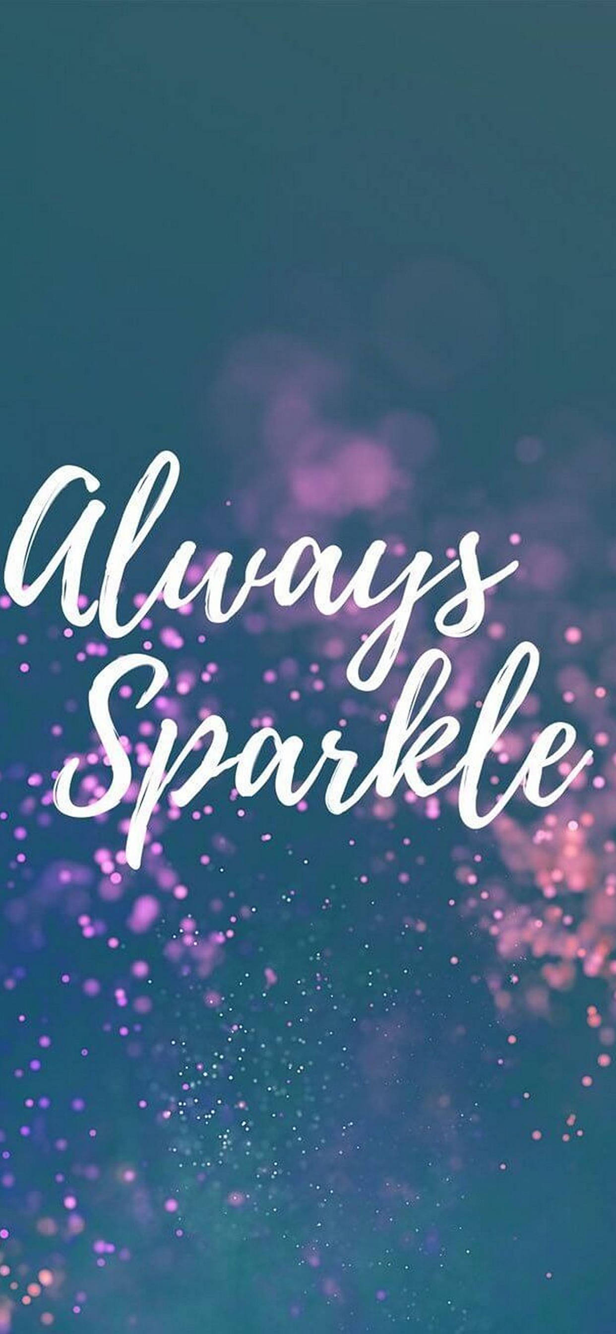 勵志 iPhone 桌布 壁紙 — 白色草書文字「Always Sparkle」漂浮在夢幻的藍綠色和紫色閃亮背景上。