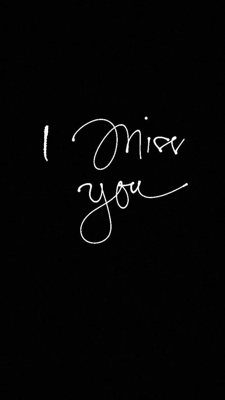 我想你 桌布 壁紙 — 白色草書文字 'I miss you' 在純黑色背景上突出顯示。