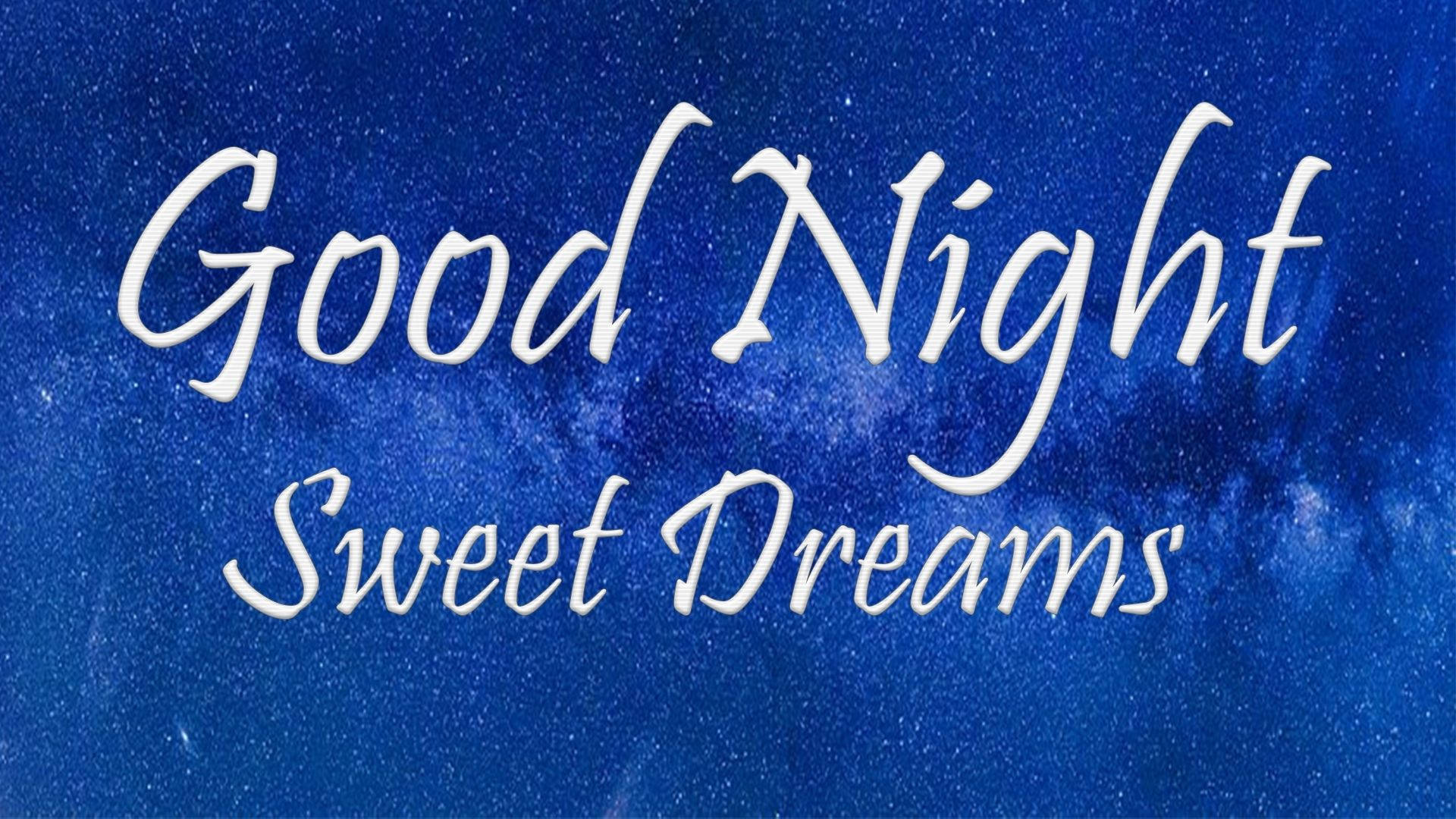 dreams 桌布 壁紙 — 白色草書文字寫著「晚安，好夢」，漂浮在深藍色星空背景上。