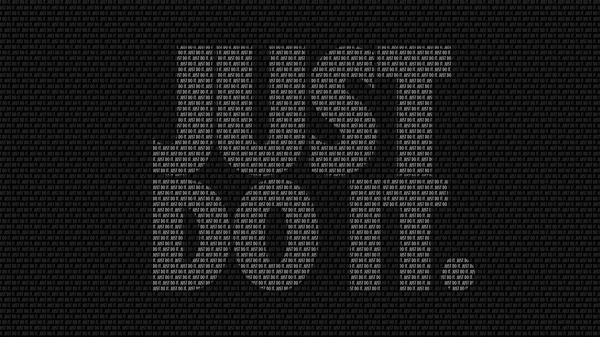 Just Do It 桌布 壁紙 — 白色重複二進制代碼在黑色背景上形成密集場域，創造出高科技數位數據流壁紙。