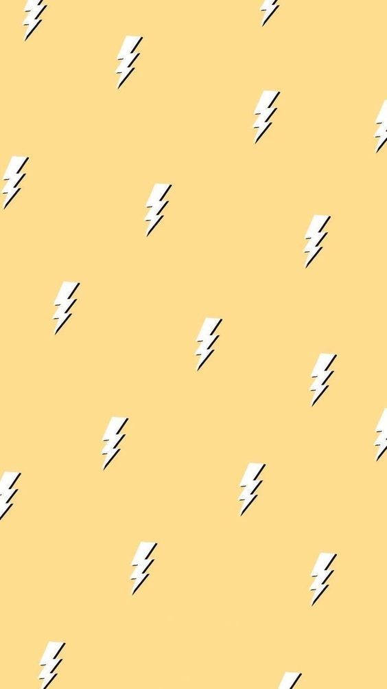 Cute Yellow Aesthetic 桌布 壁紙 — 白色閃電圖示散落在純淡黃色背景上，形成重複圖案。
