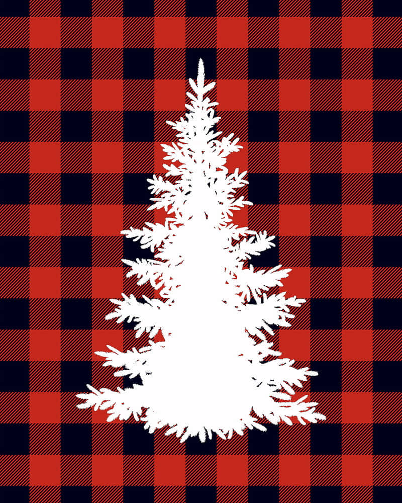 Plaid 桌布 壁紙 — 白色雪花形狀的松樹剪影在鮮明的紅黑 buffalo 格紋背景上突出顯示。