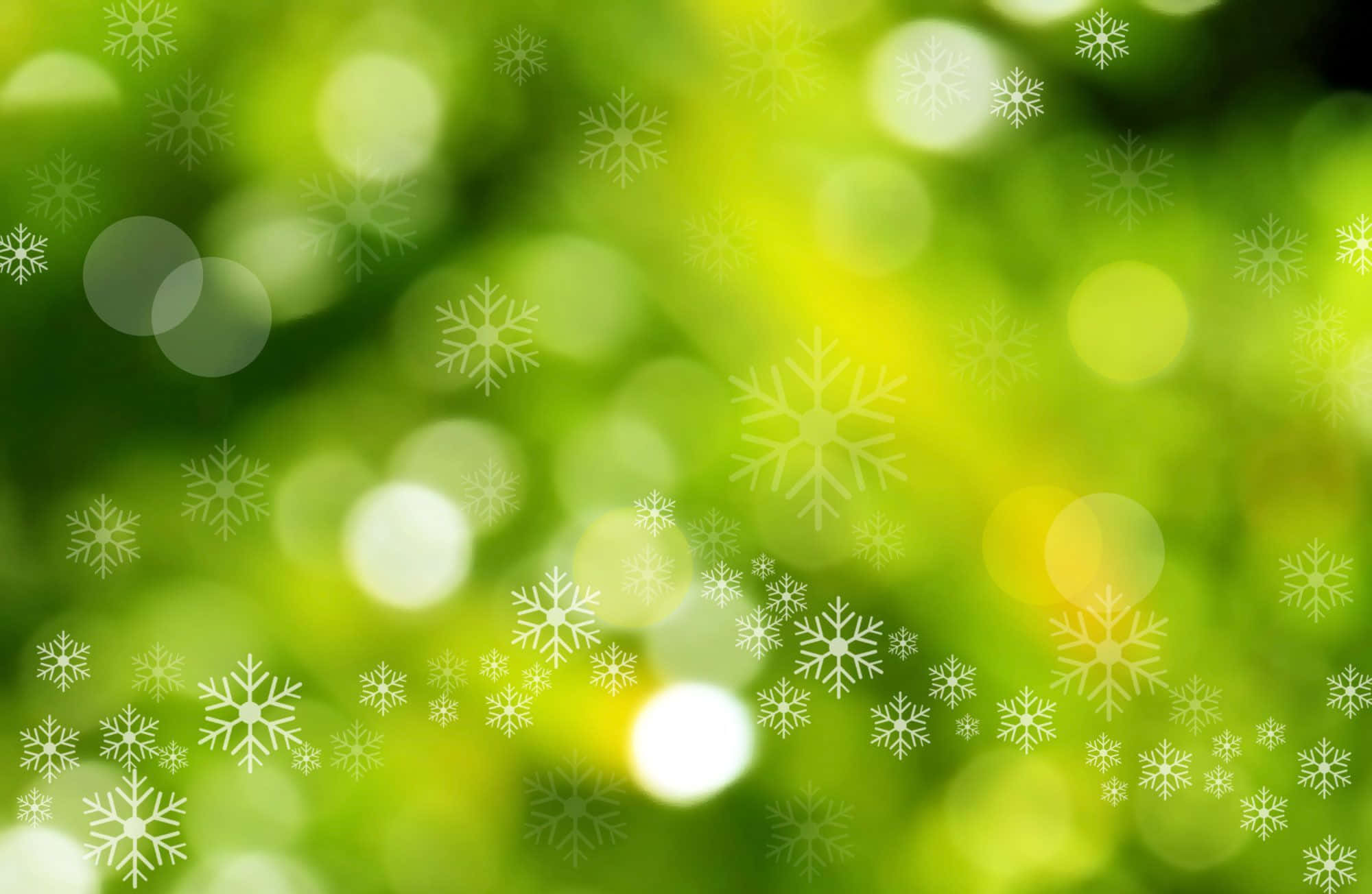 雪花 桌布 壁紙 — 白色雪花疊加層輕輕飄浮在柔和的綠色散景背景上，帶有發光的圓形亮點。