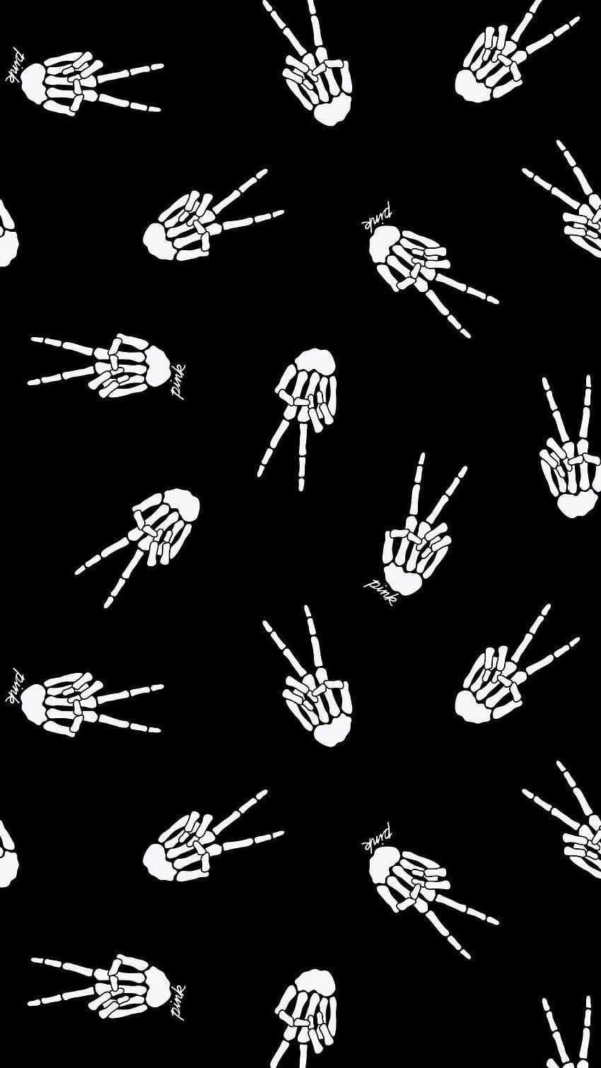 Goth Aesthetic 桌布 壁紙 — 白色骷髏手做出和平手勢，散落在黑色背景上，帶有「punk」文字。