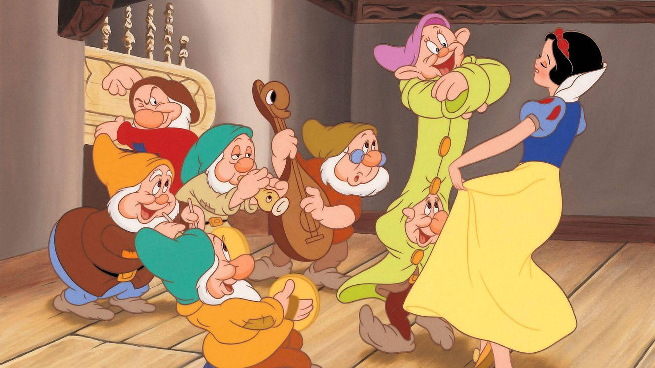 Seven Dwarfs 桌布 壁紙 — 白雪公主與七個小矮人在一個充滿溫暖燈光和歡笑的舒適木屋中快樂地跳舞。