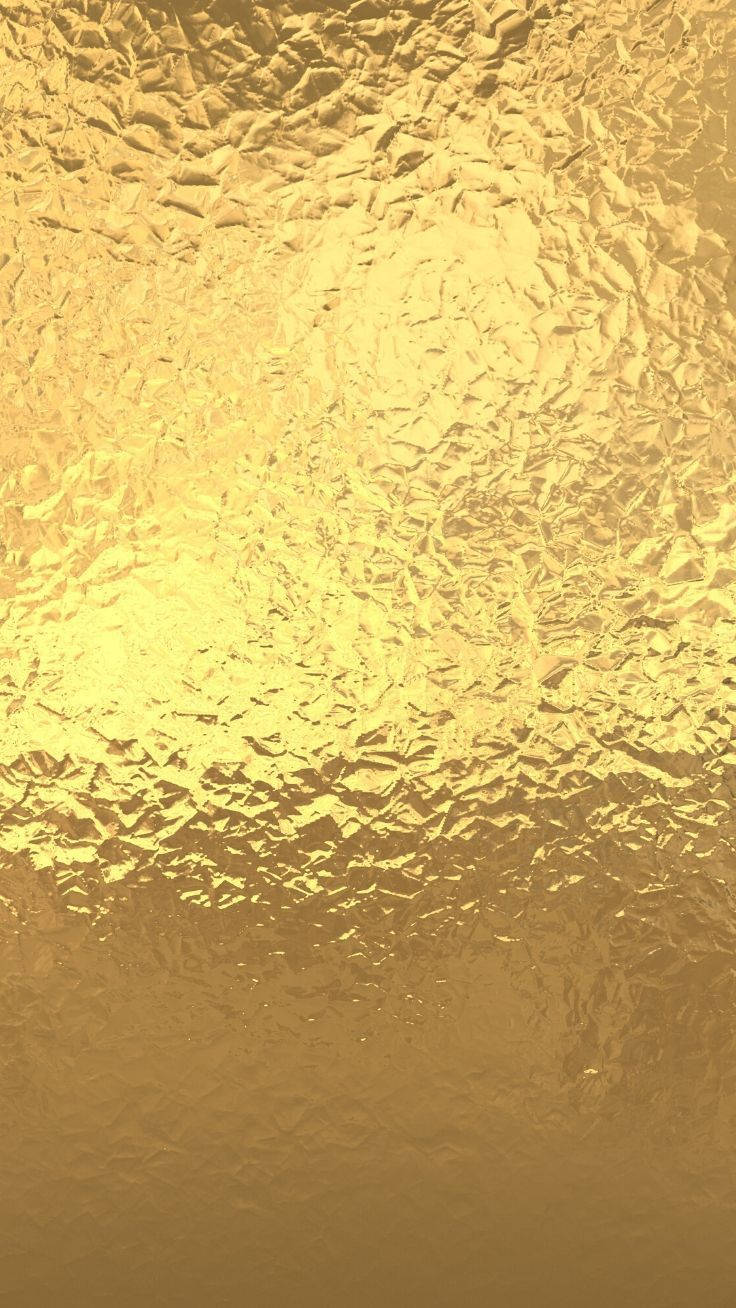 金色質感 桌布 壁紙 — 皺紋金箔的特寫，變化的高光和陰影營造出奢華的紋理表面。
