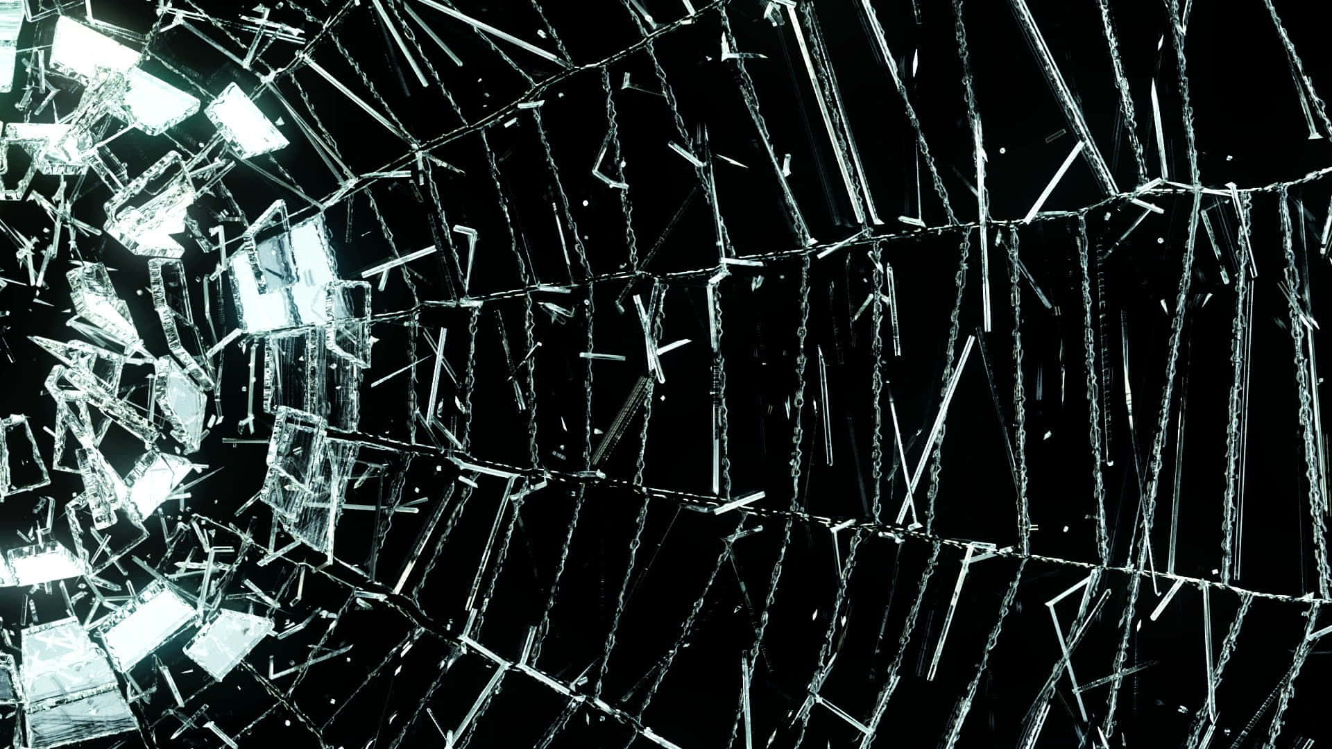 Fracture Glass 桌布 壁紙 — 破碎的玻璃碎片在漆黑的背景下閃爍著明亮的白色高光。