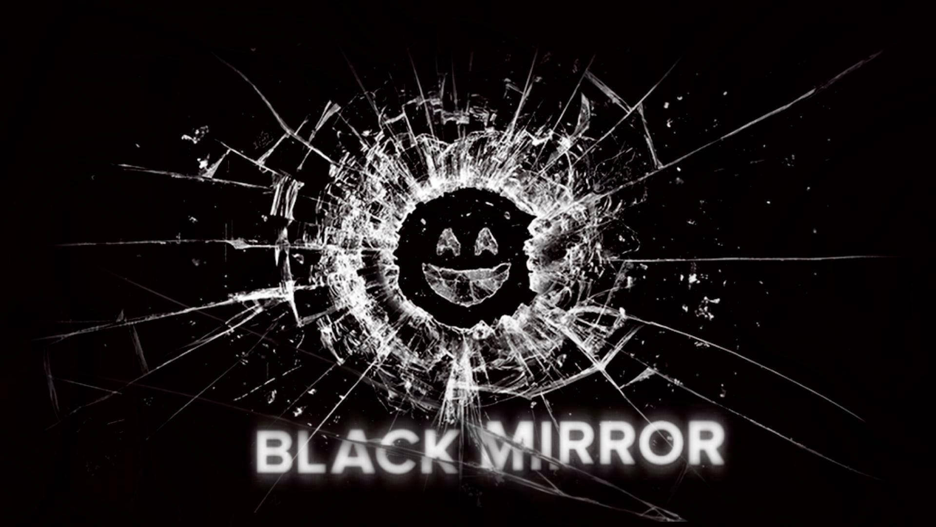 碎裂玻璃顯現一張笑臉及「BLACK MIRROR」文字。 — 電影動圖 壁紙