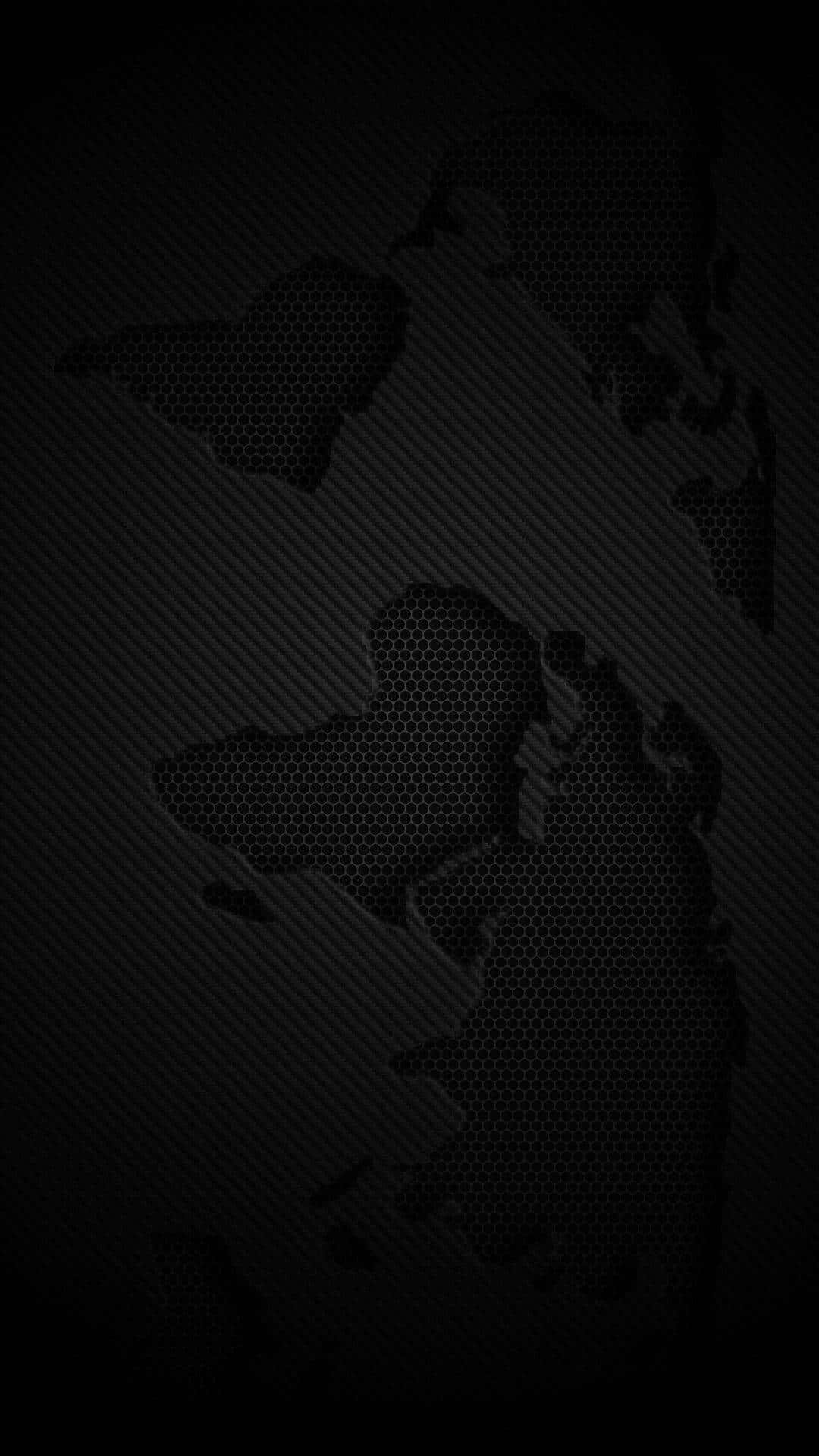 黑色 iPhone 桌布 桌布 壁紙 — 碳纖維背景上帶有六邊形紋理的深色世界地圖輪廓。