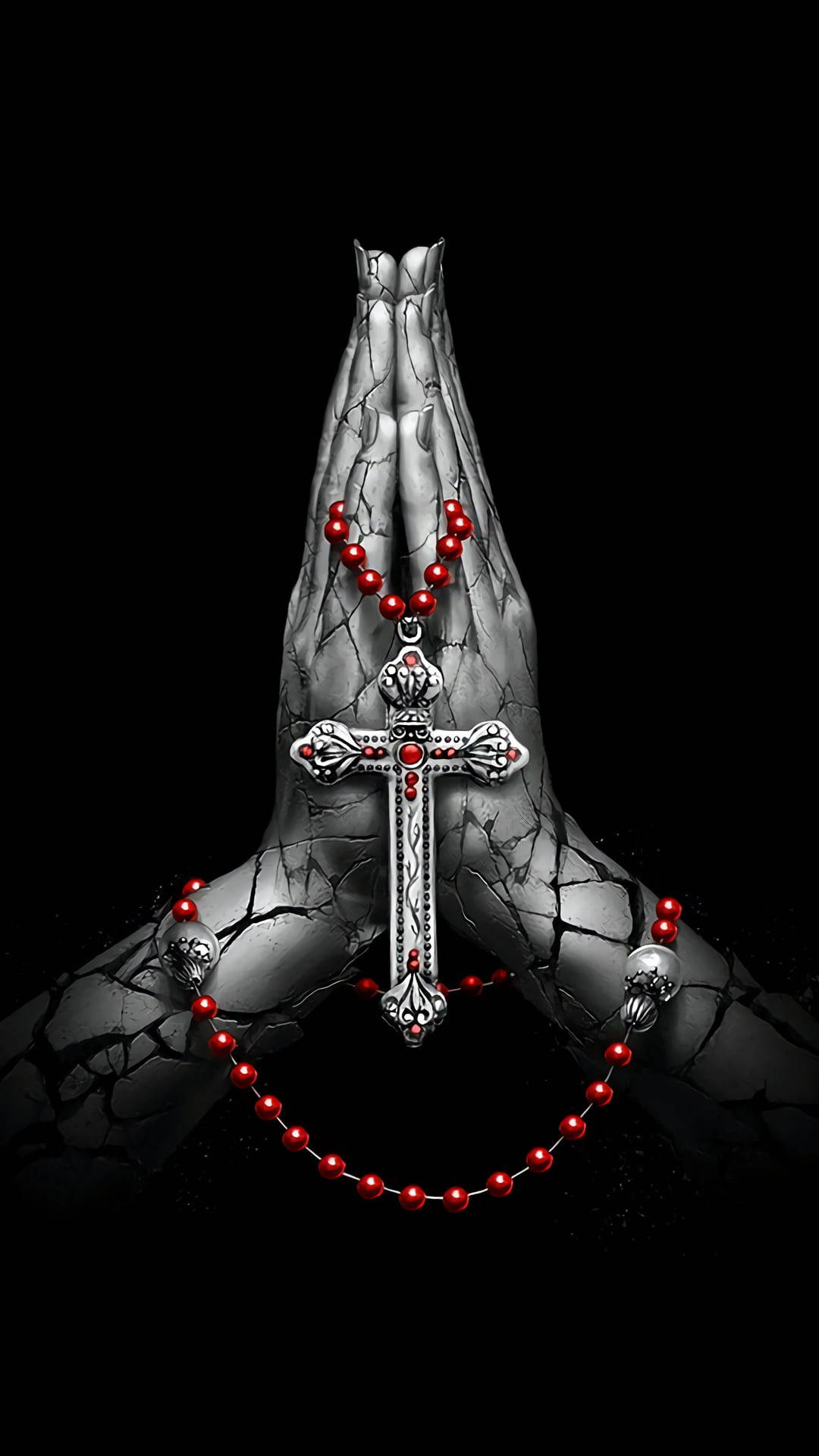 Praying 桌布 壁紙 — 祈禱中裂開的雙手，在純黑背景上握著銀色十字架和紅色玫瑰經念珠。