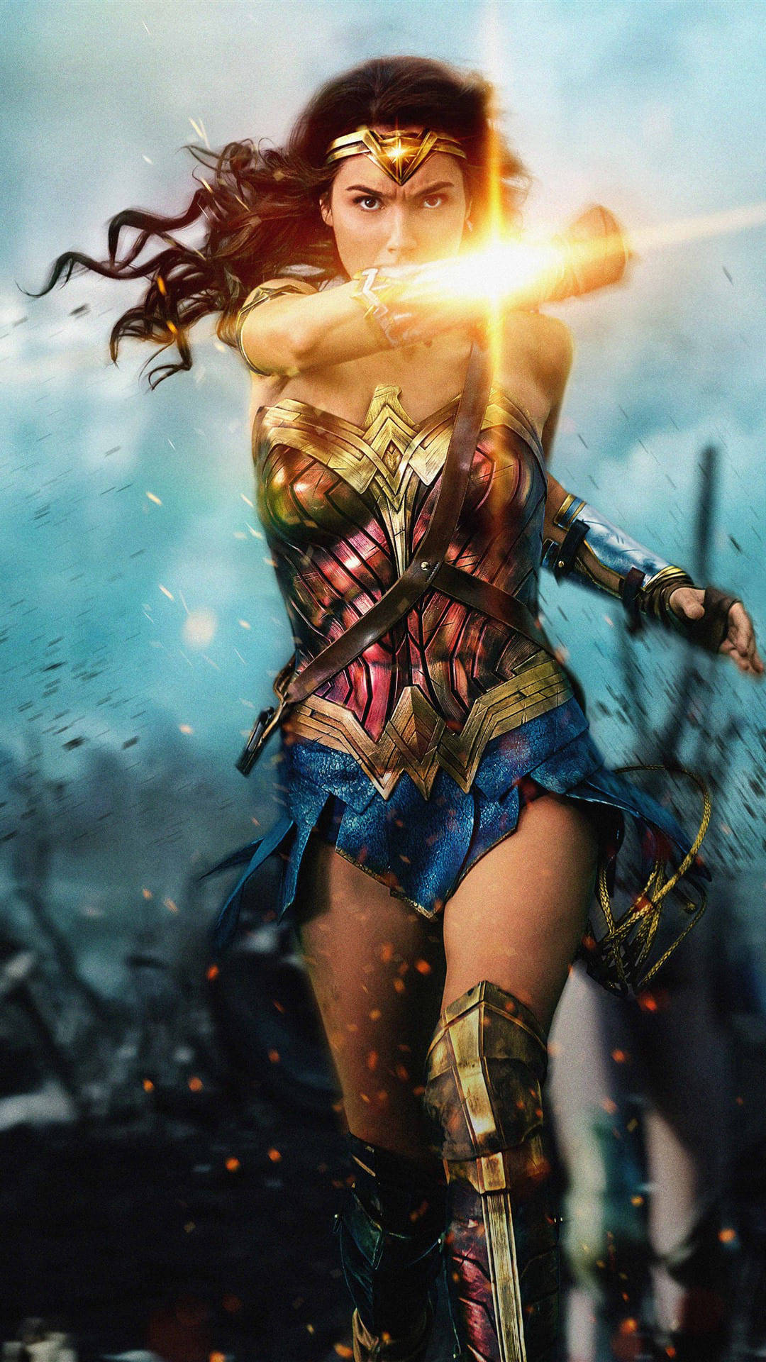 Wonder Woman 桌布 壁紙 — 神力女超人穿著標誌性服裝，在暴風雨戰場背景下釋放出強大的金色套索衝擊波。