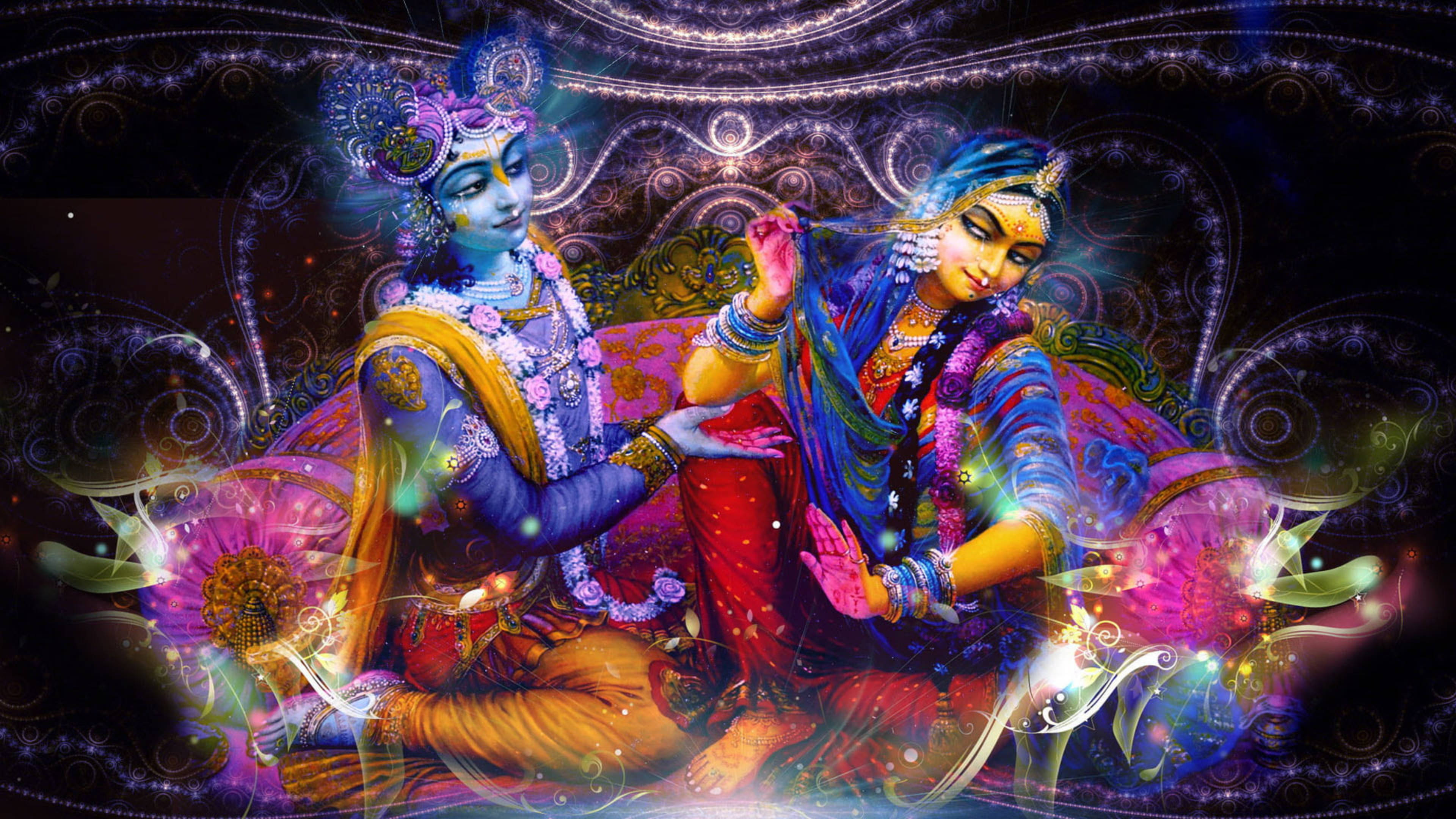 krishna ji 桌布 壁紙 — 神聖的人物穿著華麗的藍色和金色服飾，優雅地坐在旋轉的宇宙圖案和發光粒子之中。