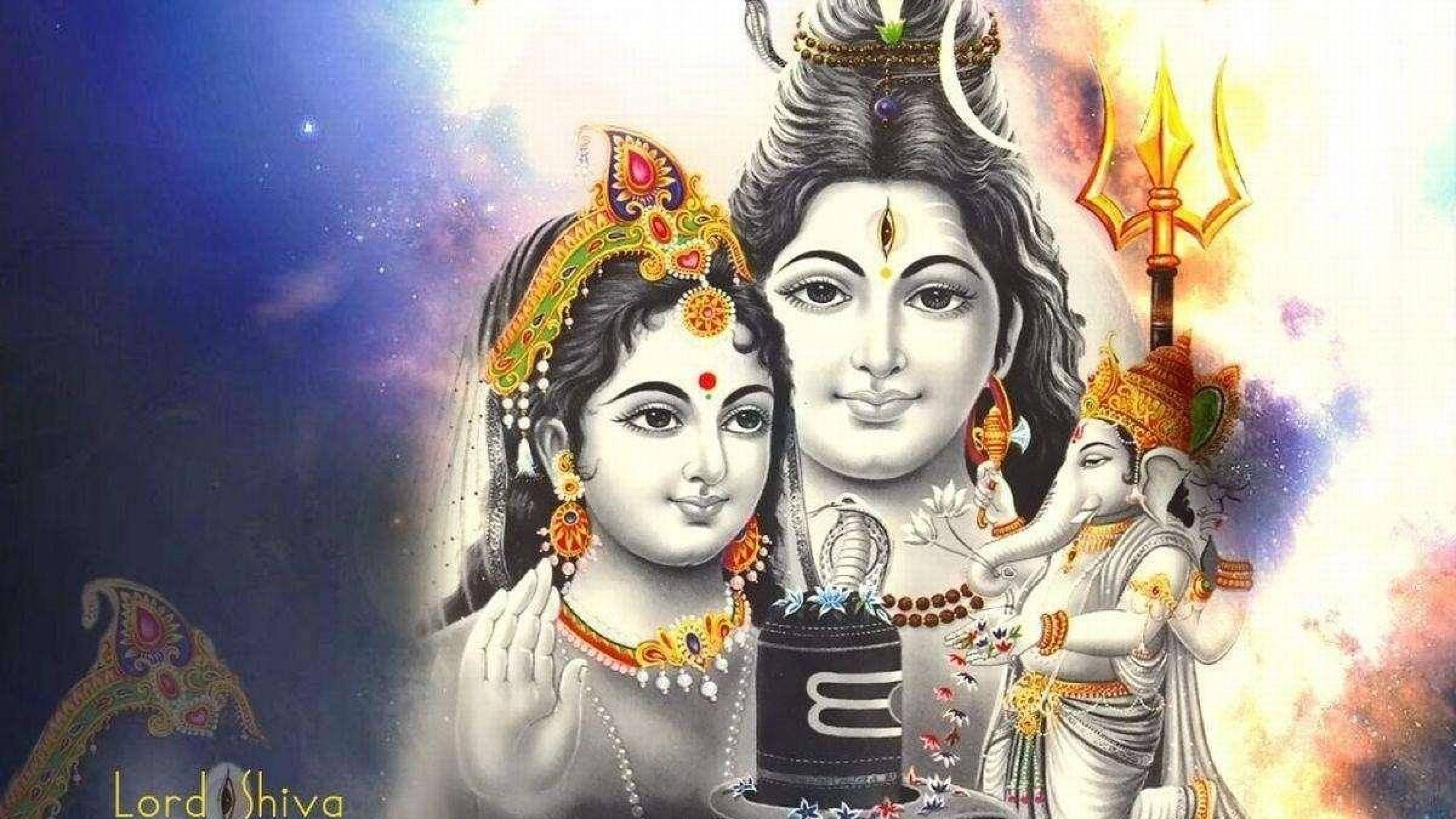 濕婆神 桌布 壁紙 — 神聖的印度教神祇濕婆與帕爾瓦蒂，飾以精緻珠寶，背景為宇宙，包含象頭神與三叉戟。