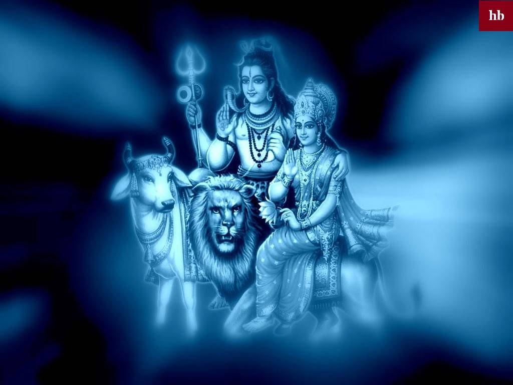 shiv shankar HD 桌布 壁紙 — 神聖的濕婆與帕爾瓦蒂端坐著，伴隨著公牛和獅子，在發光的藍色單色靈性場景中。